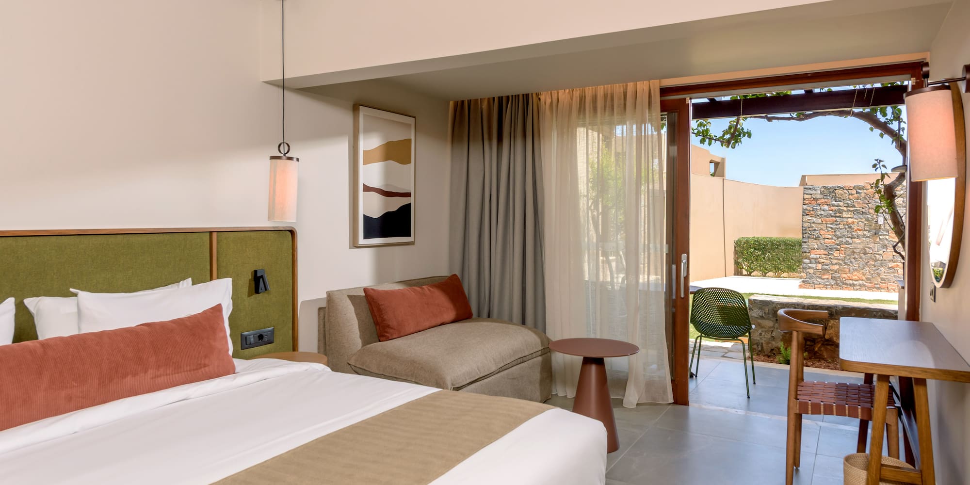 a room with a bed and a table.