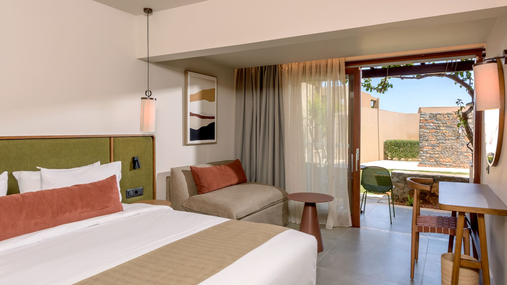 a room with a bed and a table.