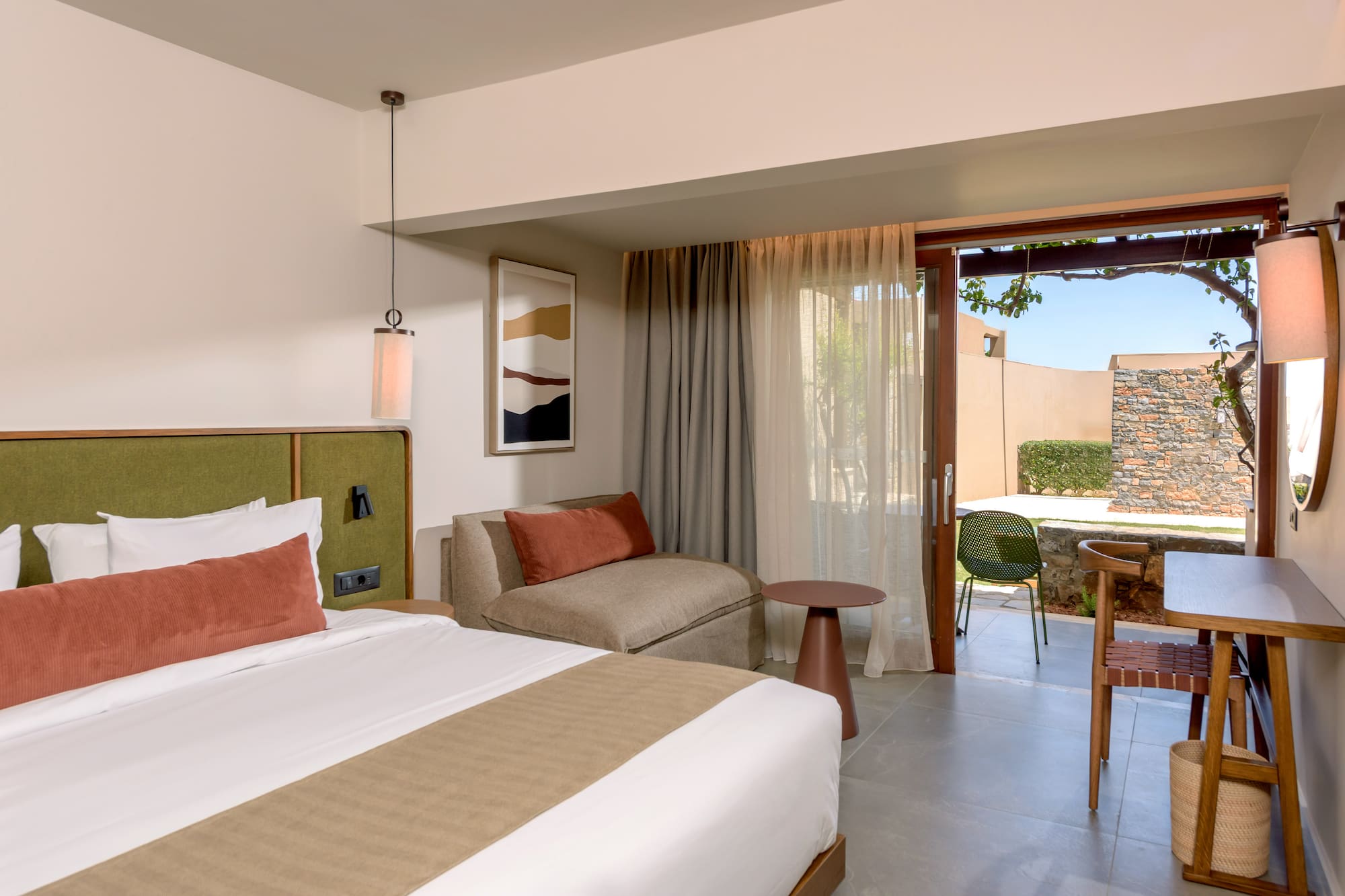 a room with a bed and a table.