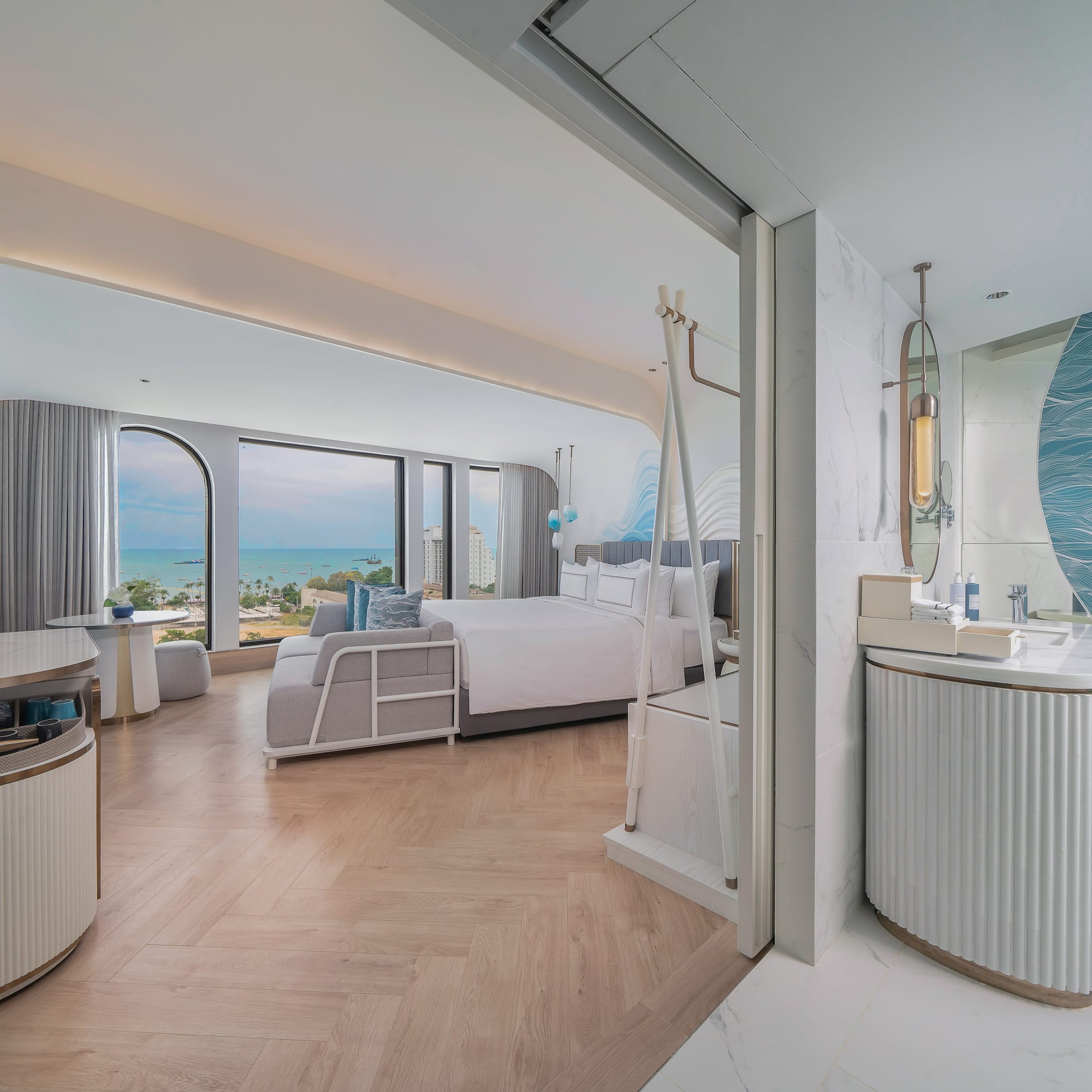 a room with a bed and a mirror