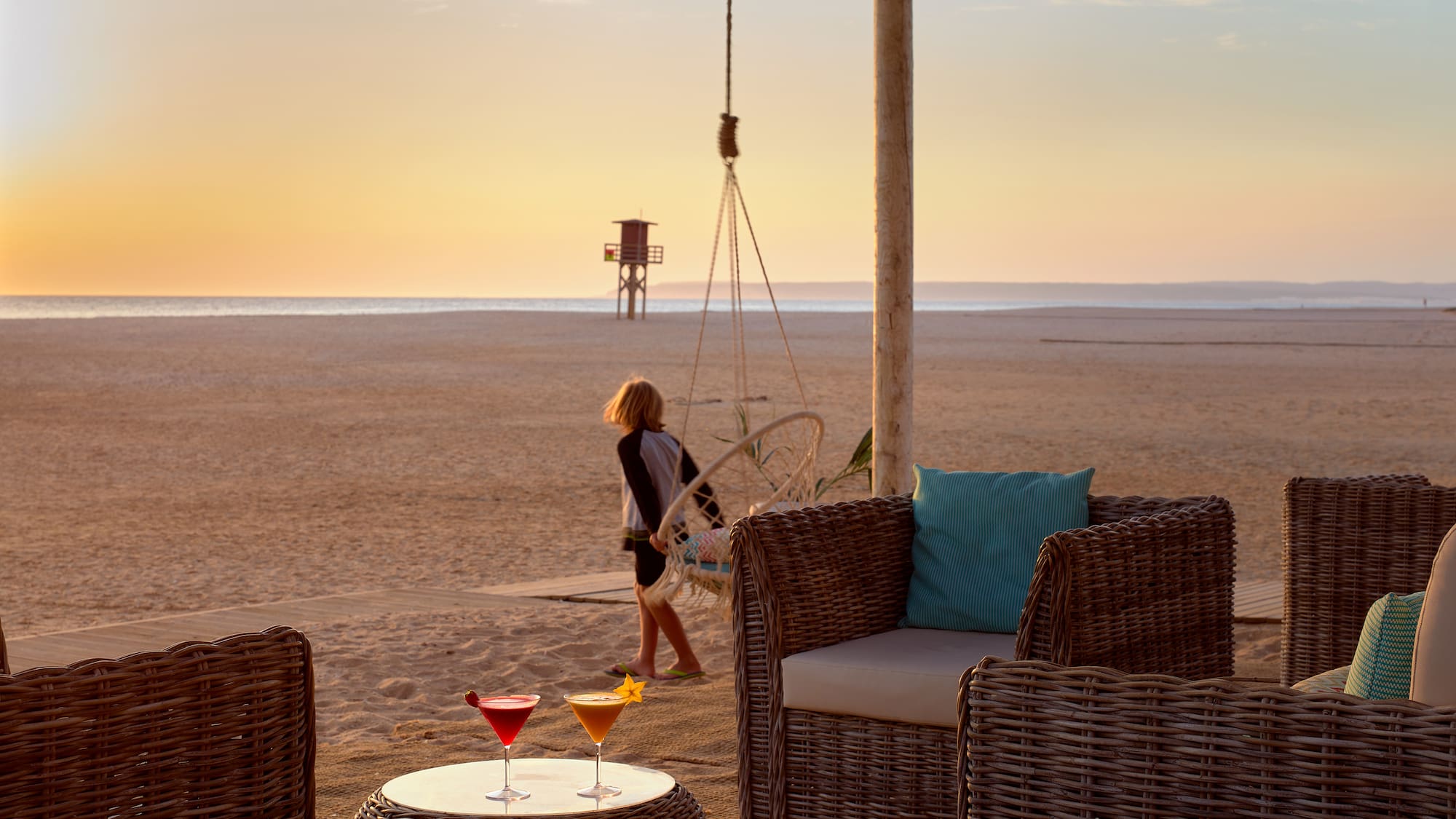 a person walking on a beach