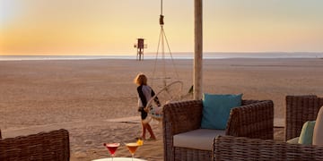 a person walking on a beach