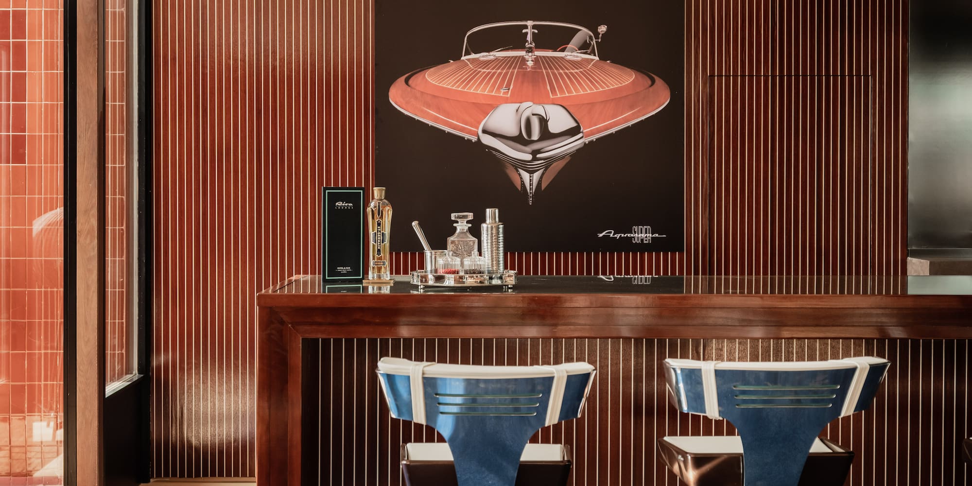 a bar with a painting of a ship on it