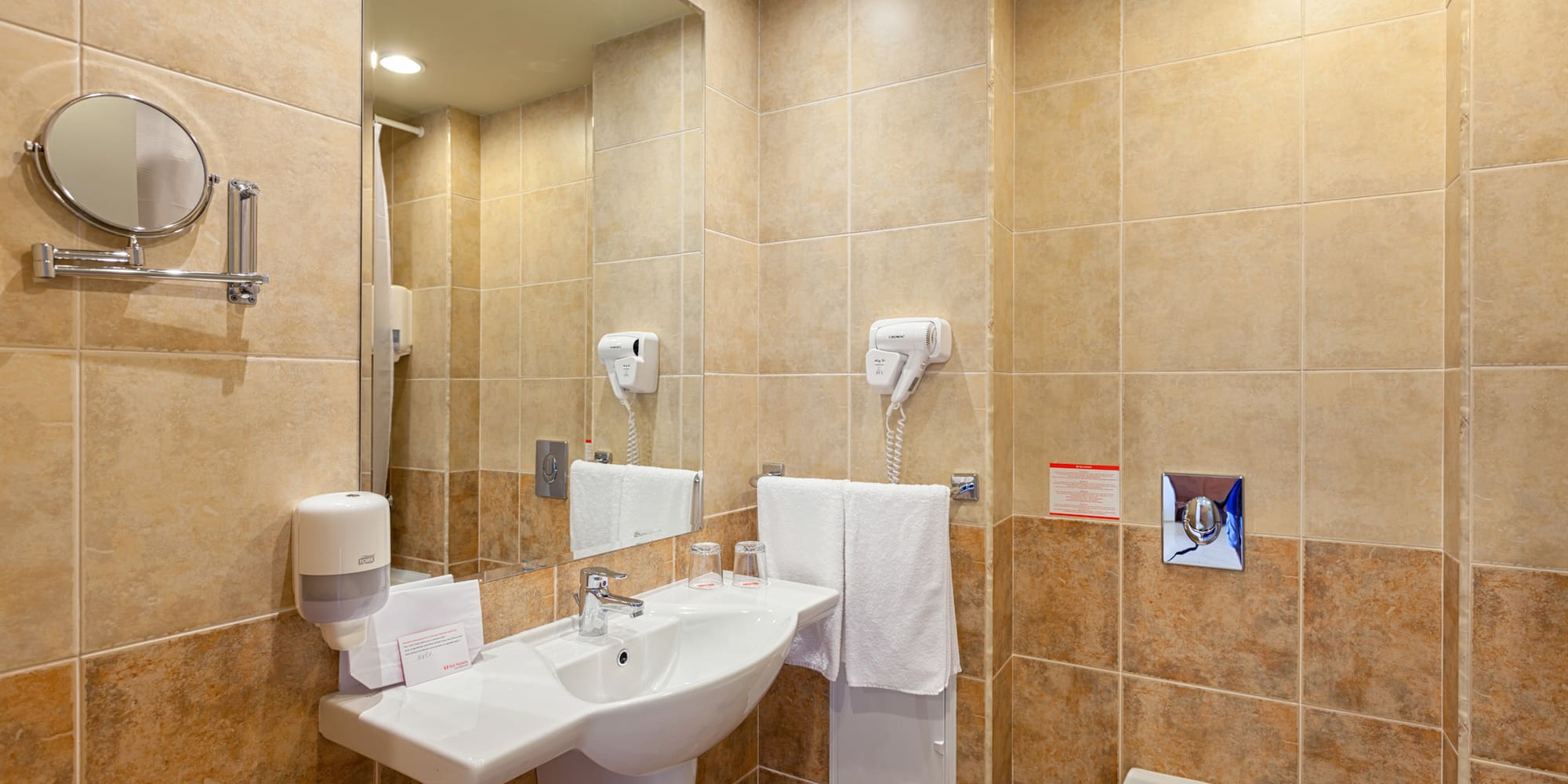 a bathroom with a sink and toilet