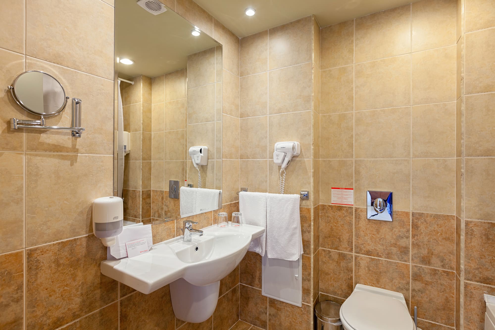 a bathroom with a sink and toilet