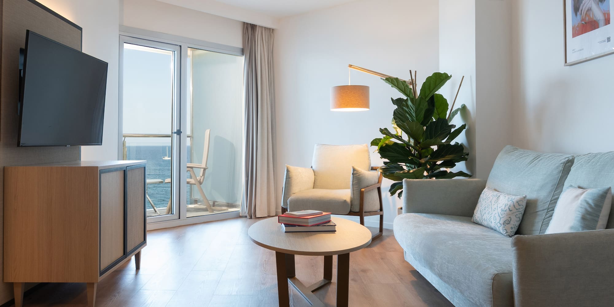 a living room with a television and a couch