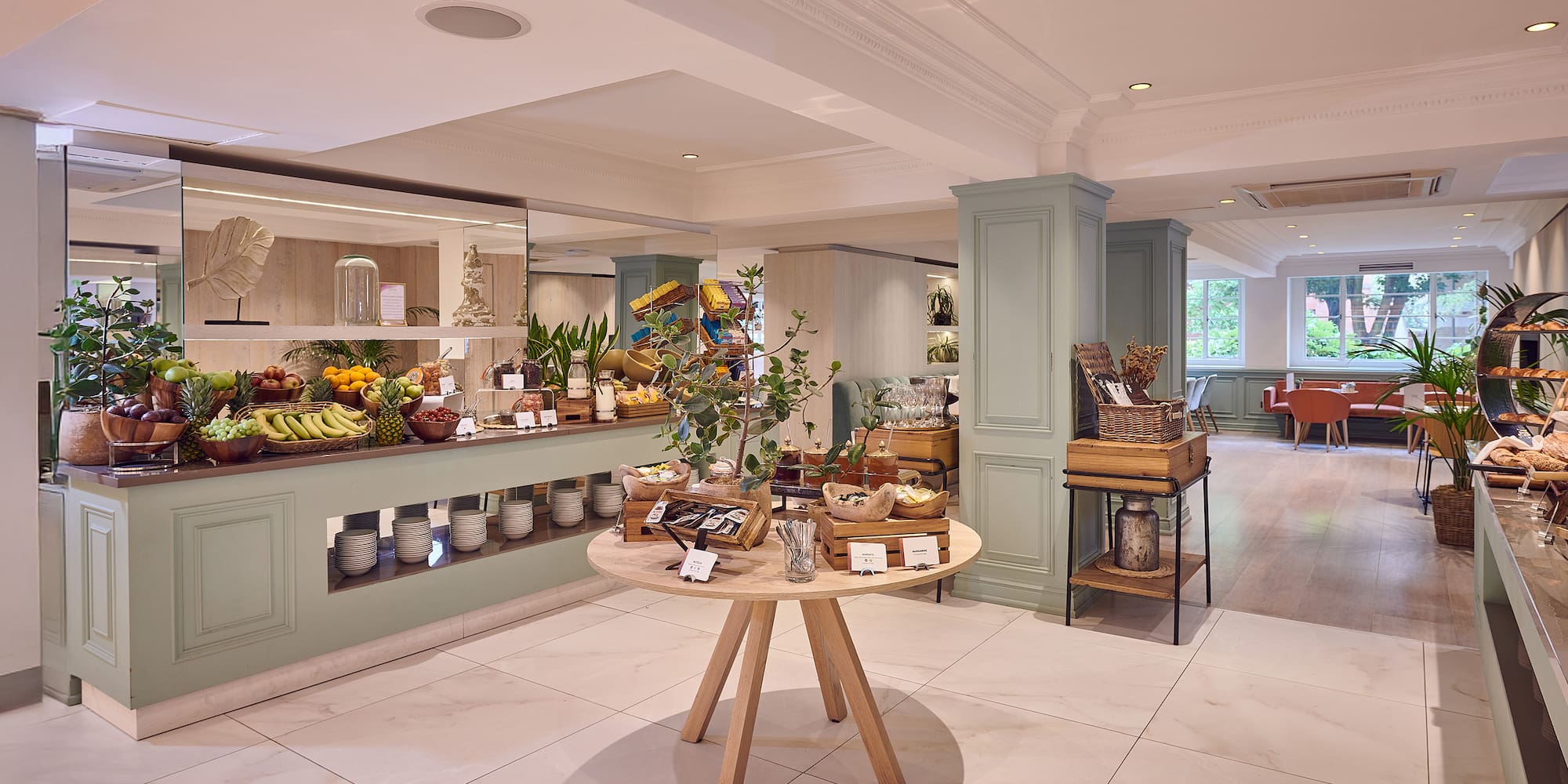 a room with a table and shelves of food