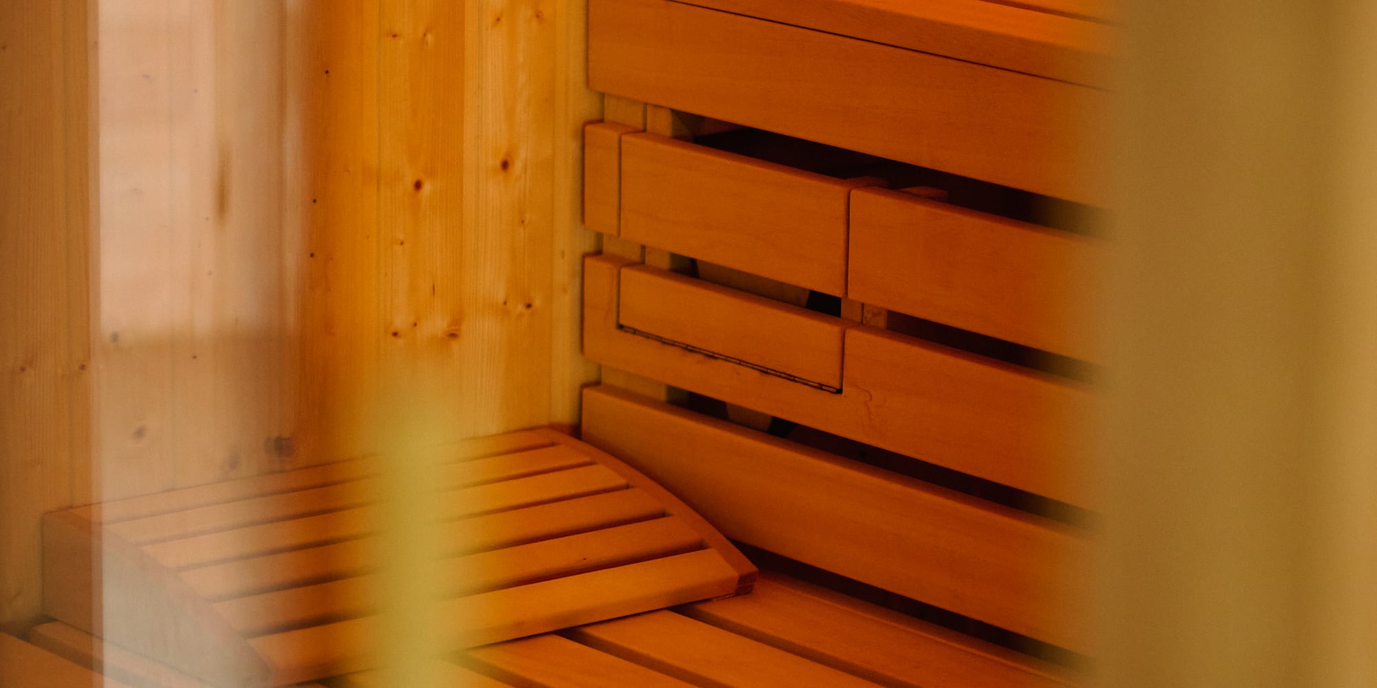 a wooden bench in a sauna