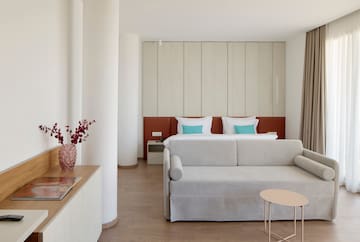 a room with a bed and a couch