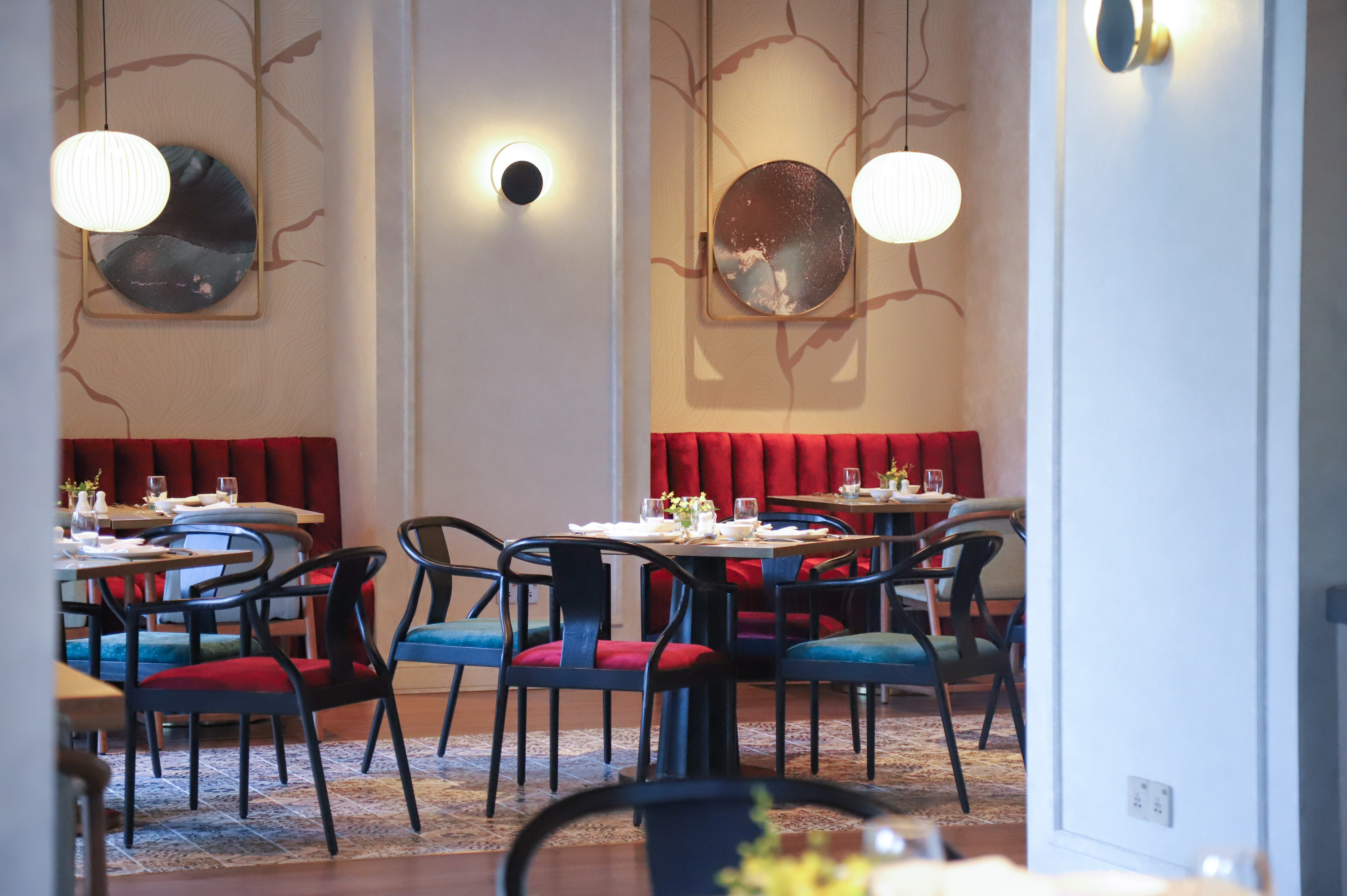 a restaurant with tables and chairs