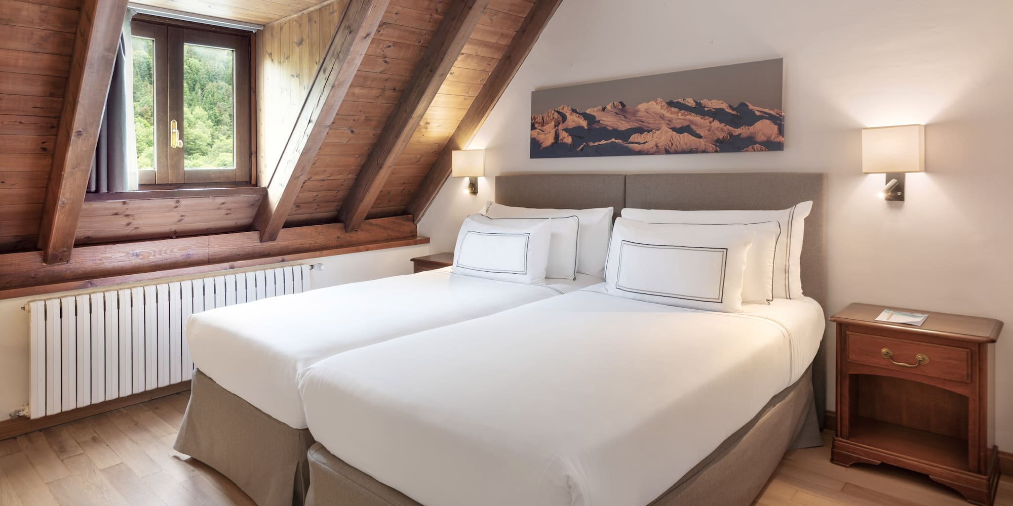 a bedroom with two beds