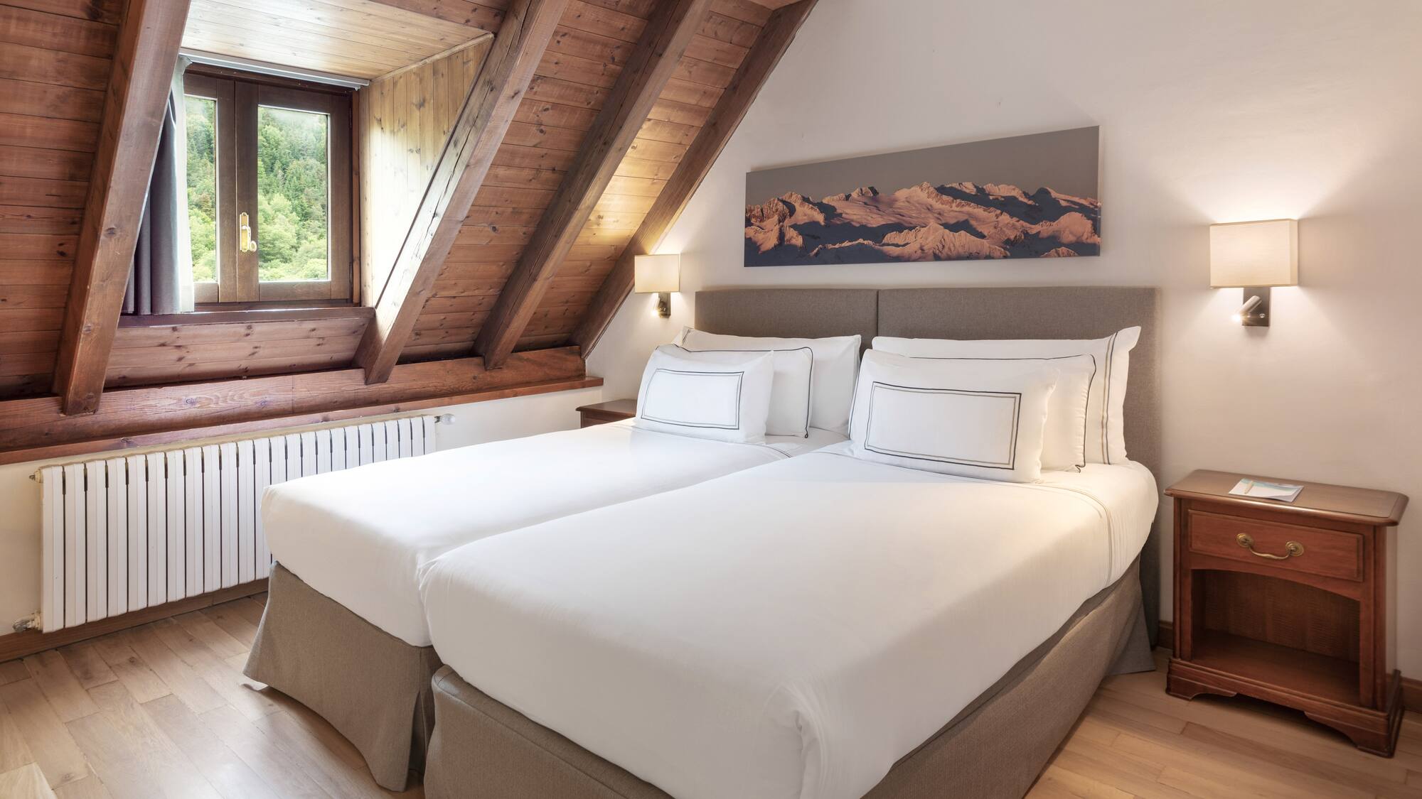 a bedroom with two beds