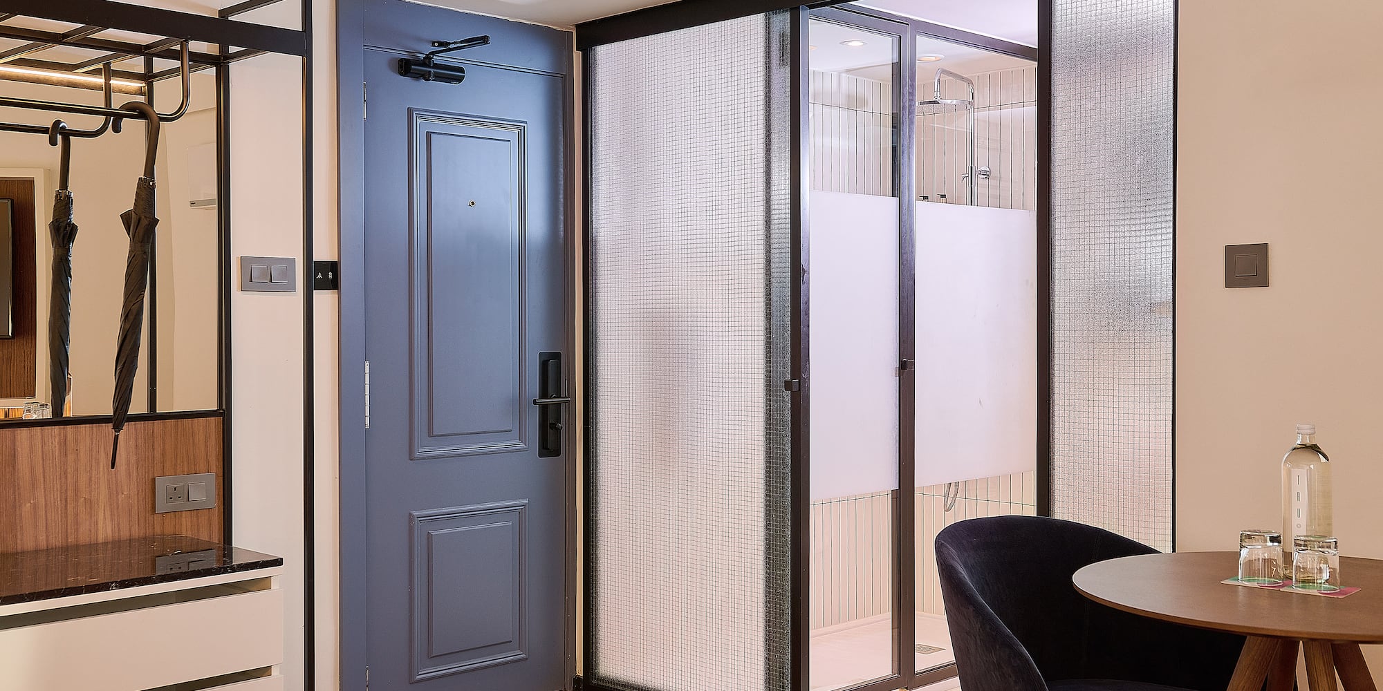 a room with a table and chairs