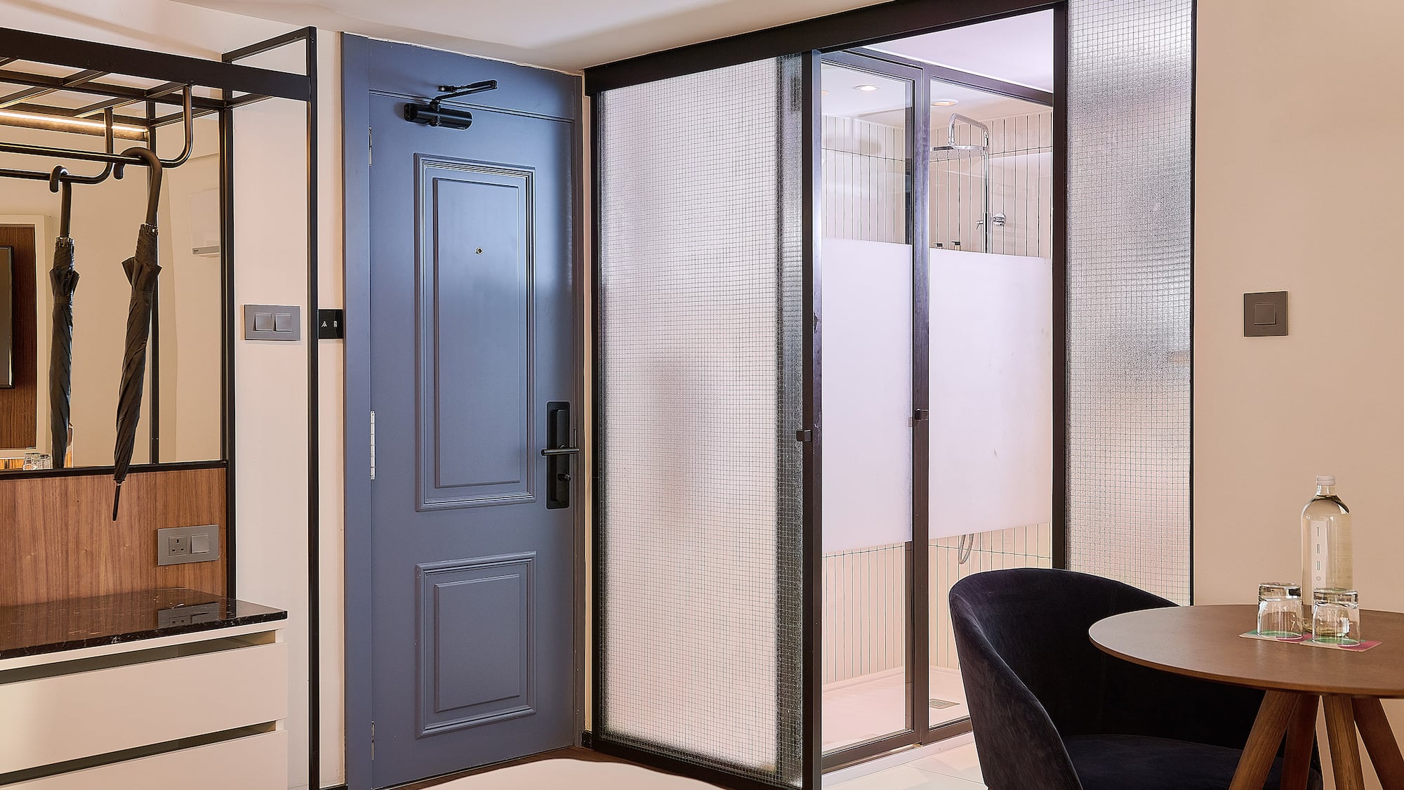 a room with a table and chairs