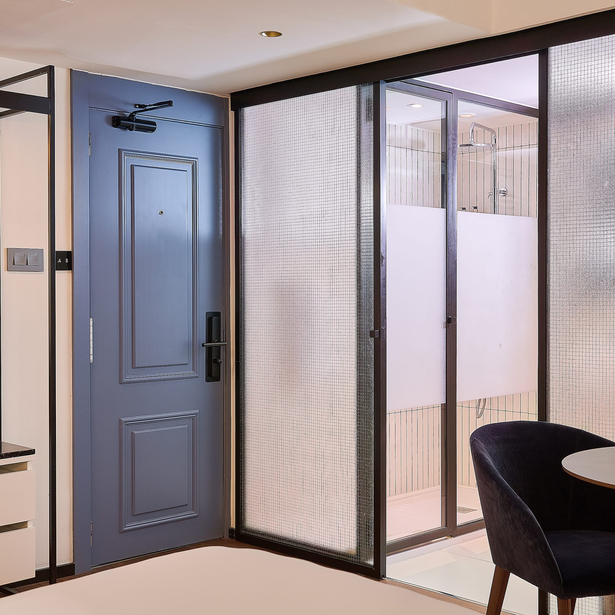 a room with a table and chairs