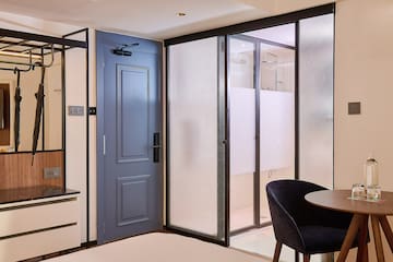 a room with a table and chairs