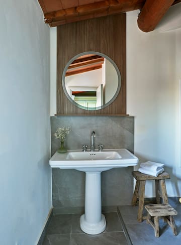 a sink and mirror in a bathroom