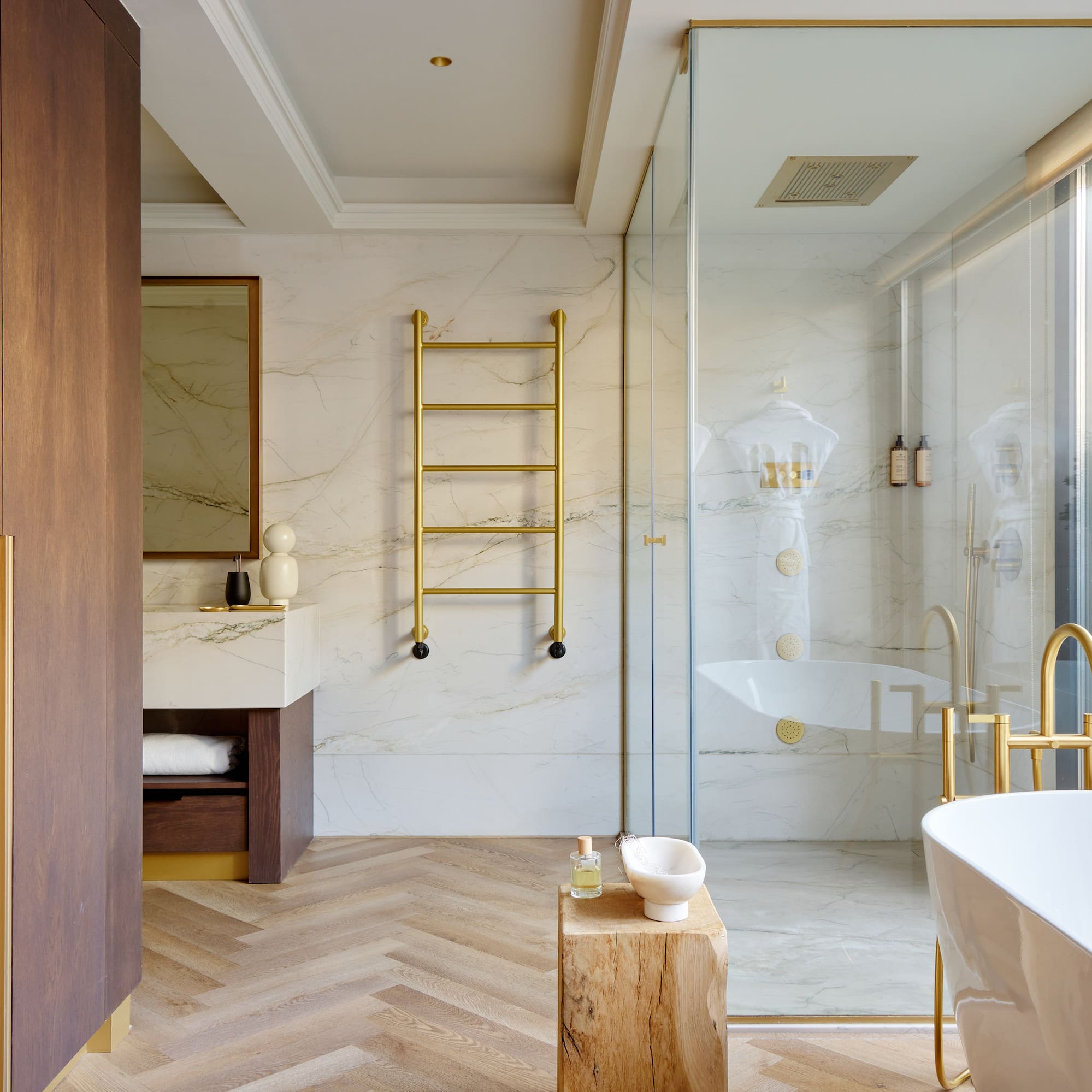 a bathroom with a tub and shower