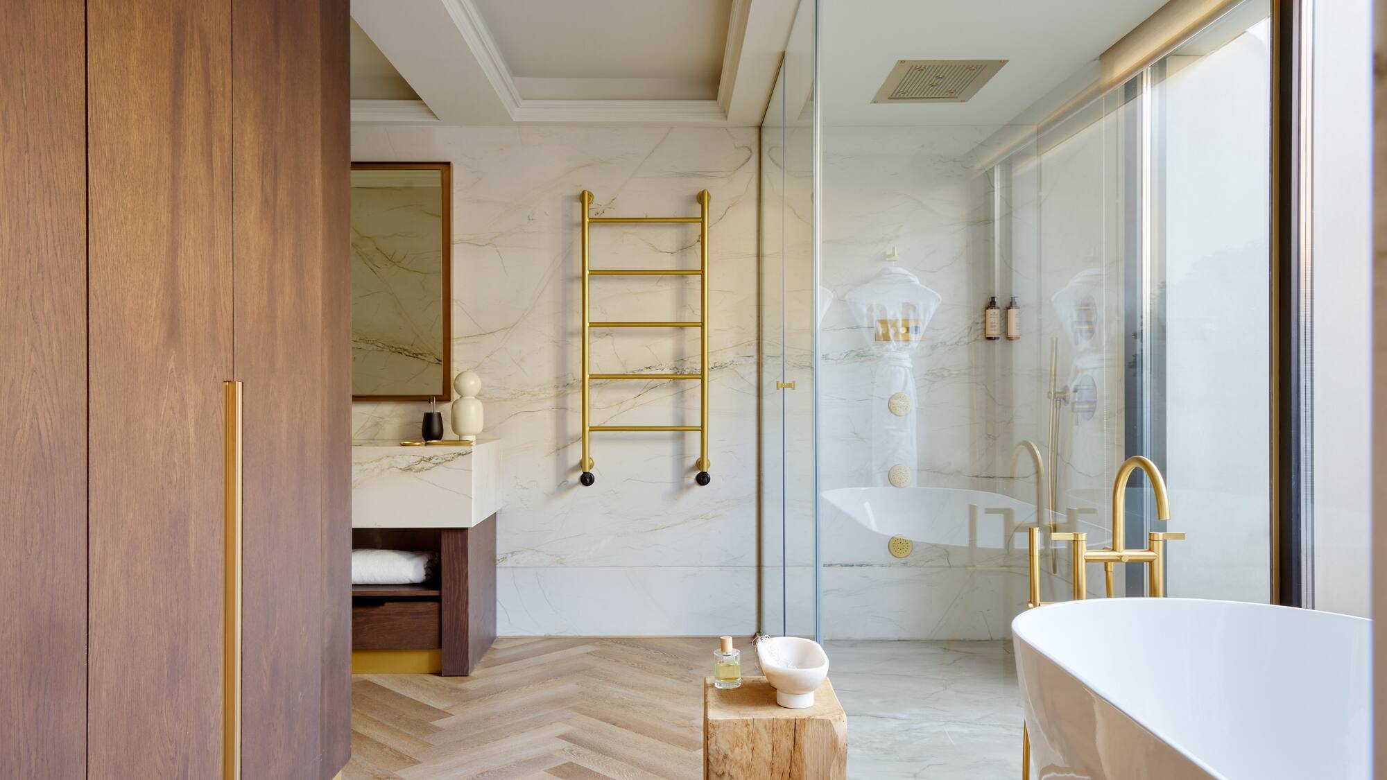a bathroom with a tub and shower