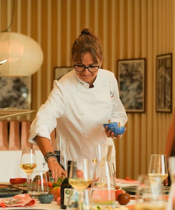 a woman in a white coat