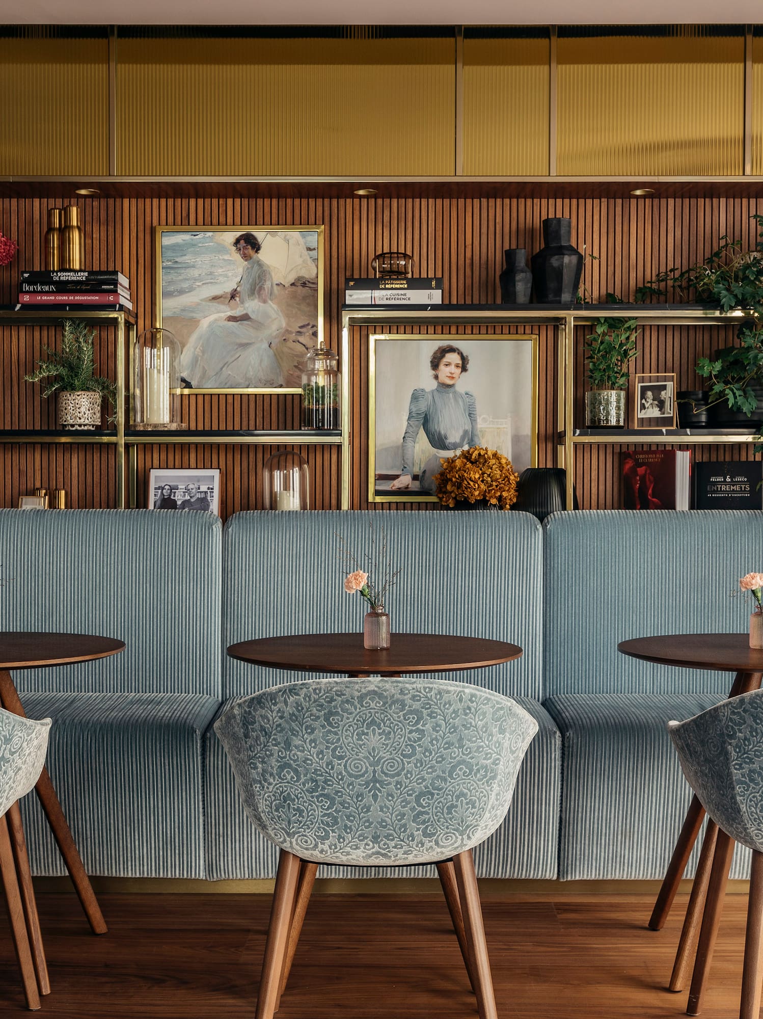 a room with a couch and tables