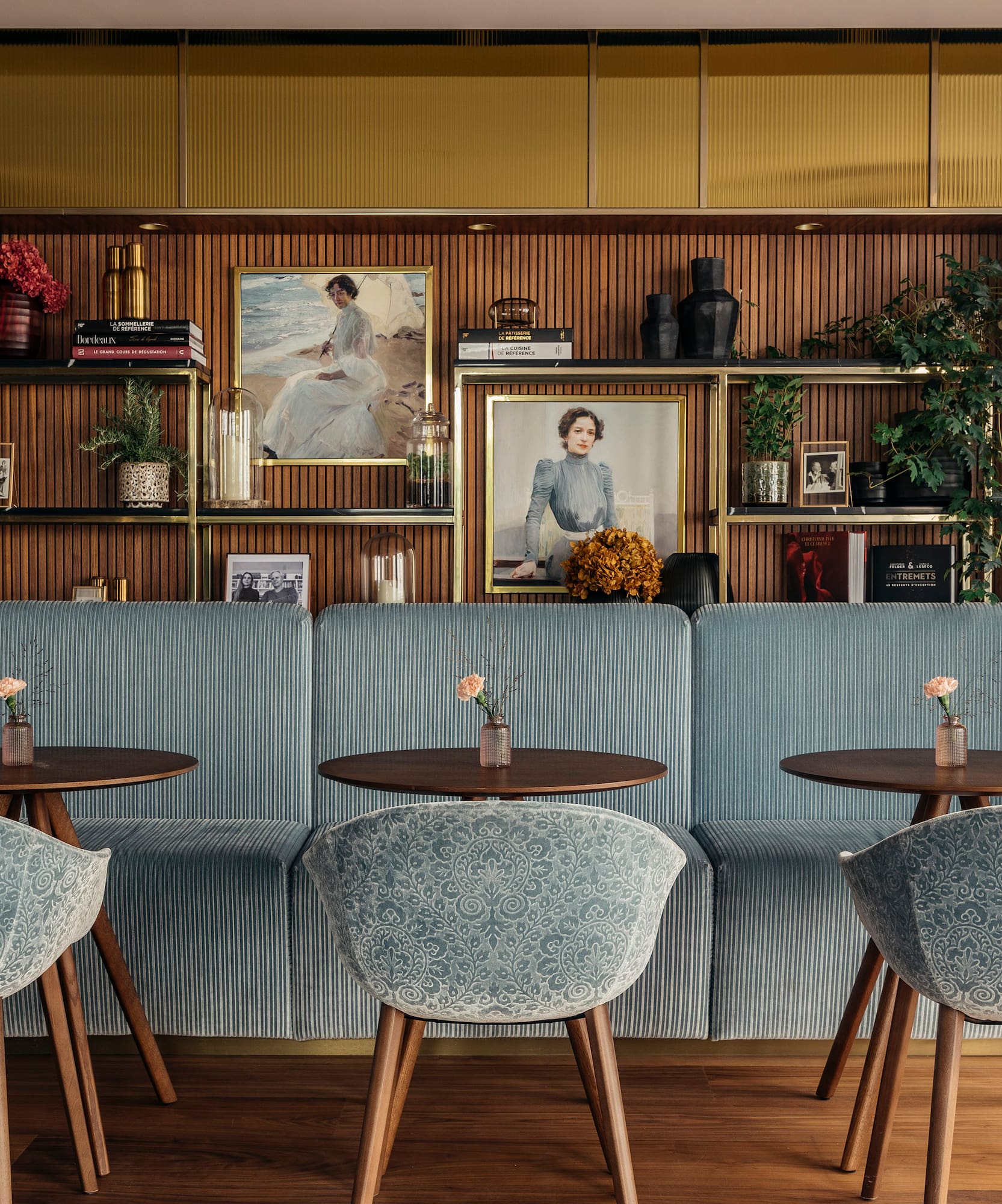 a room with a couch and tables