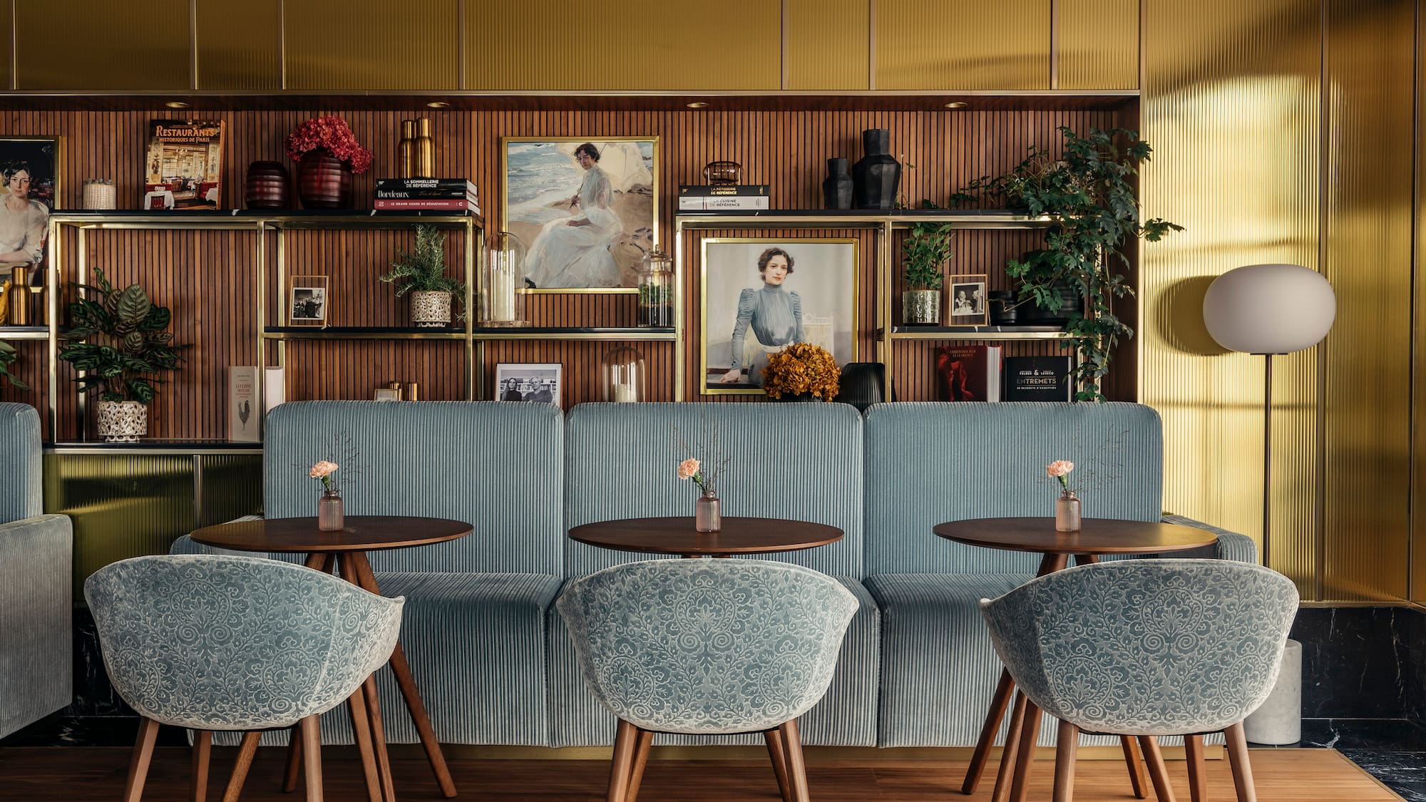 a room with a couch and tables