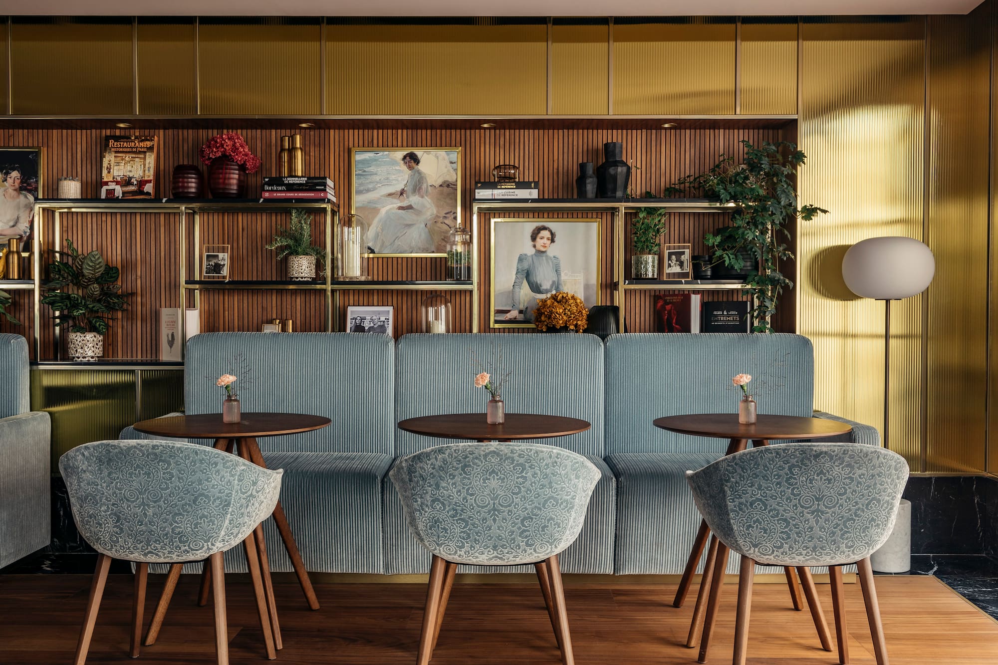 a room with a couch and tables