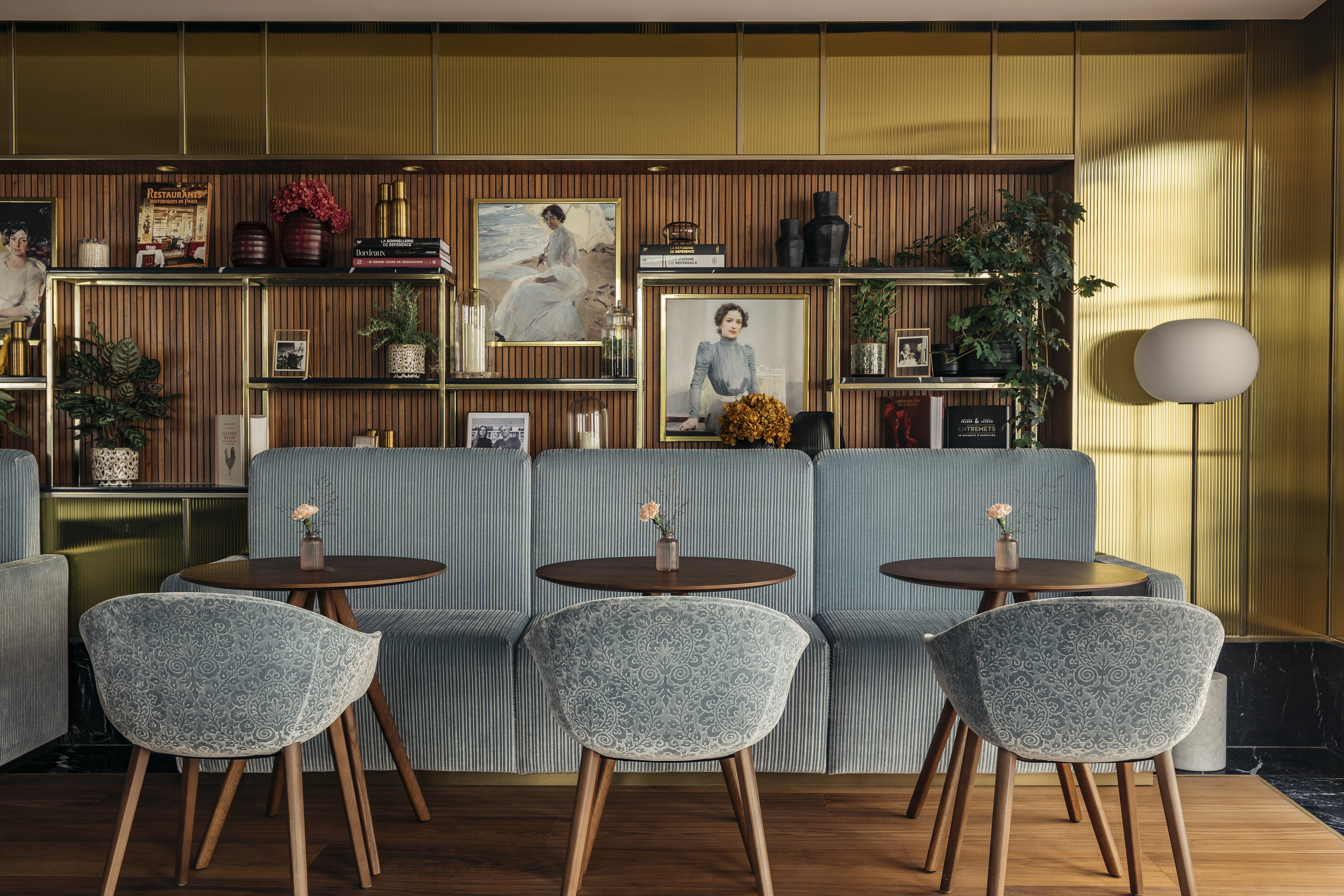 a room with a couch and tables