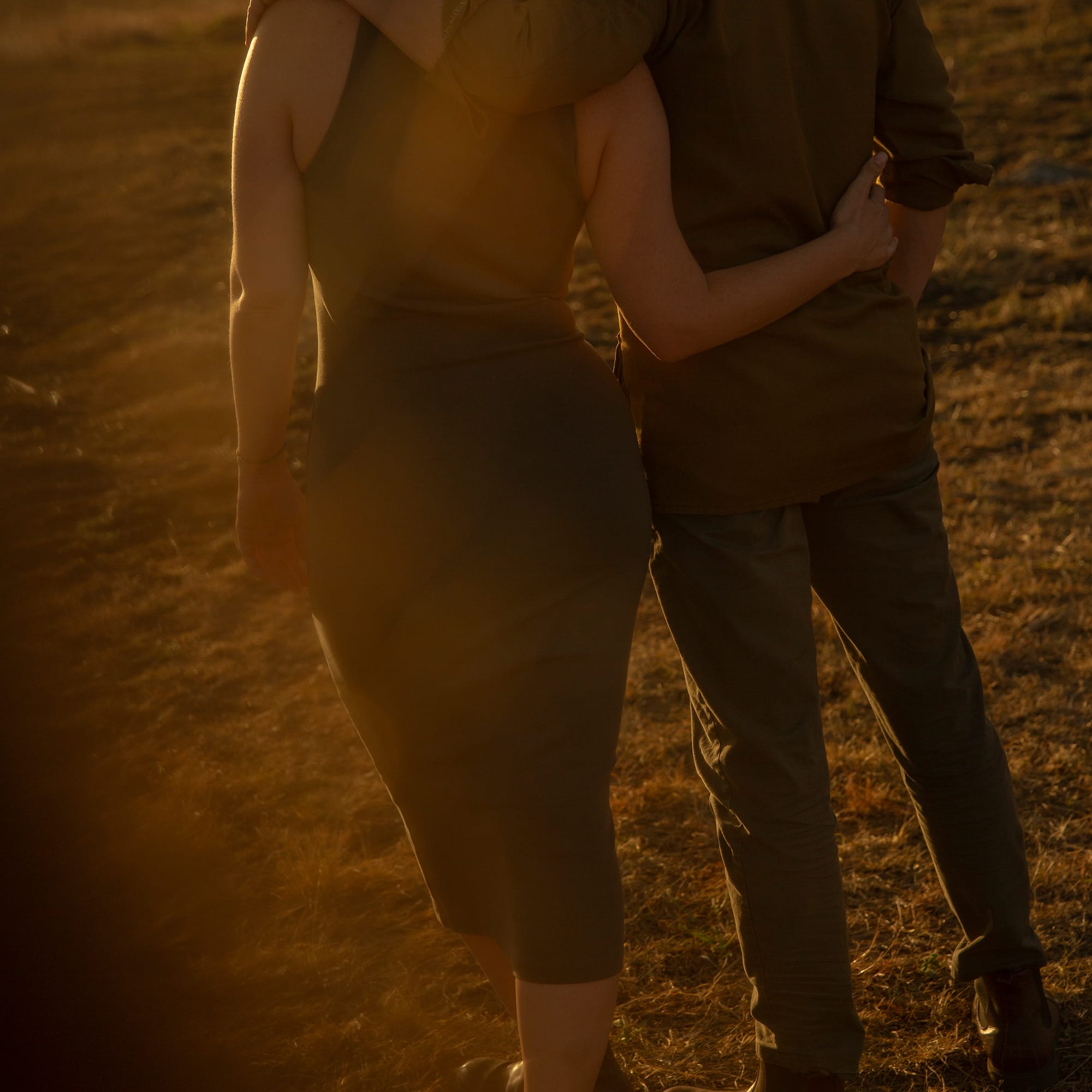 a man and woman hugging each other