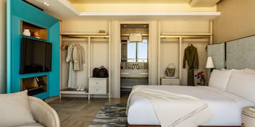 a room with a bed and closets