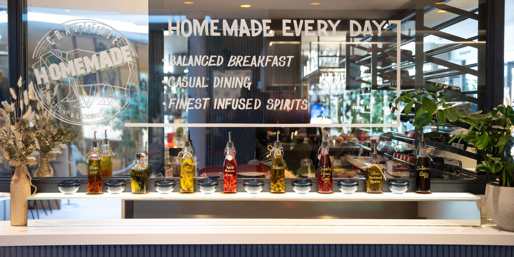 a display of a restaurant with bottles of liquid