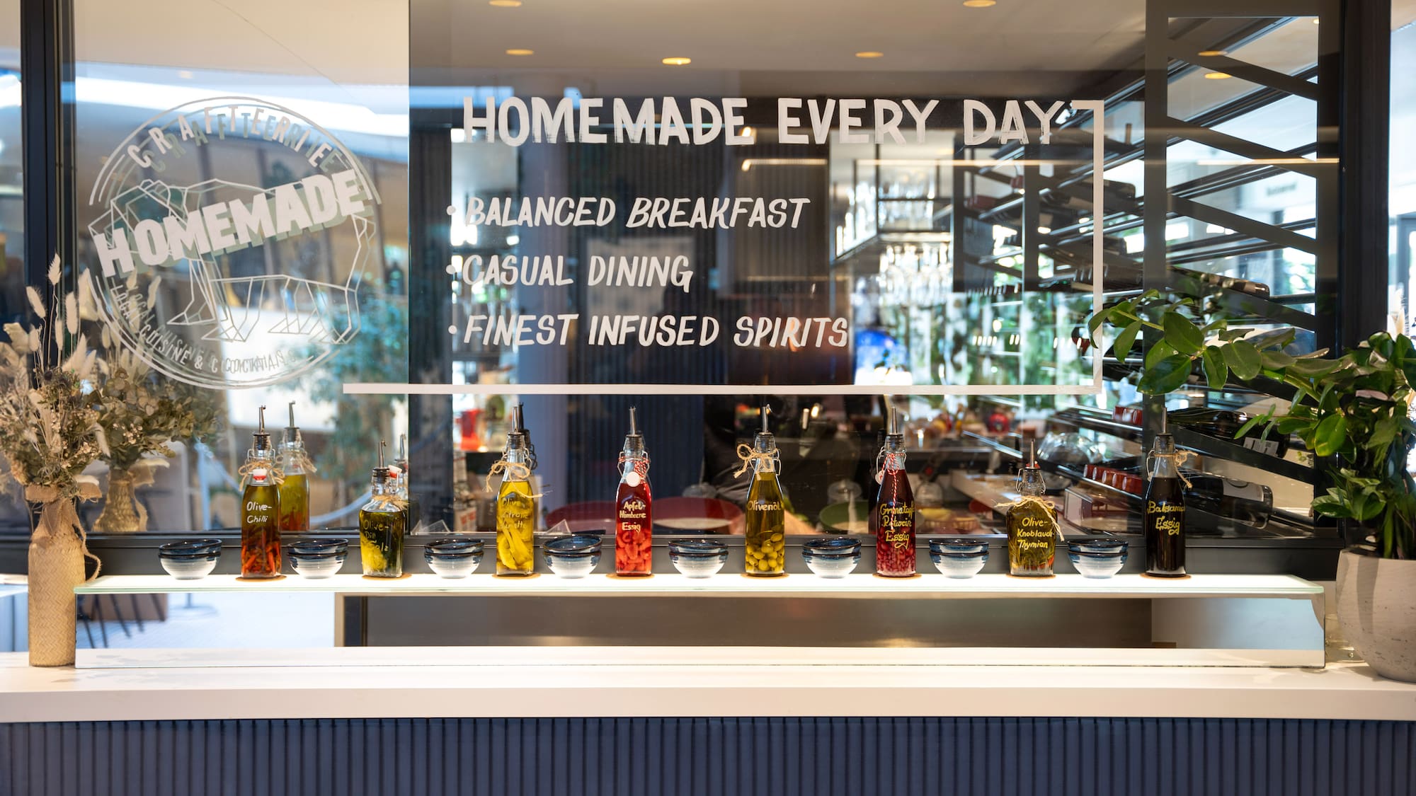 a display of a restaurant with bottles of liquid