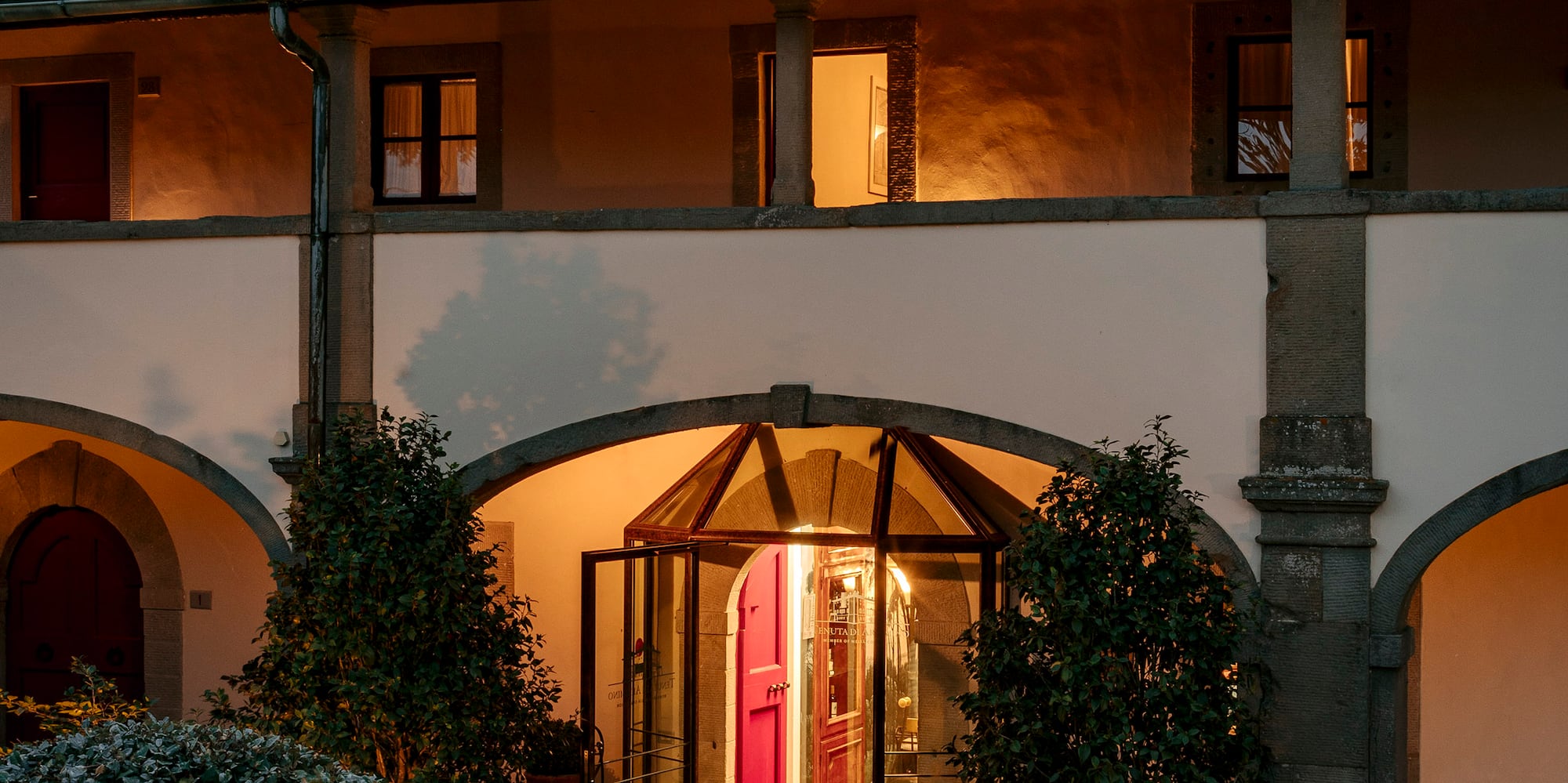 a building with a glass door and a courtyard