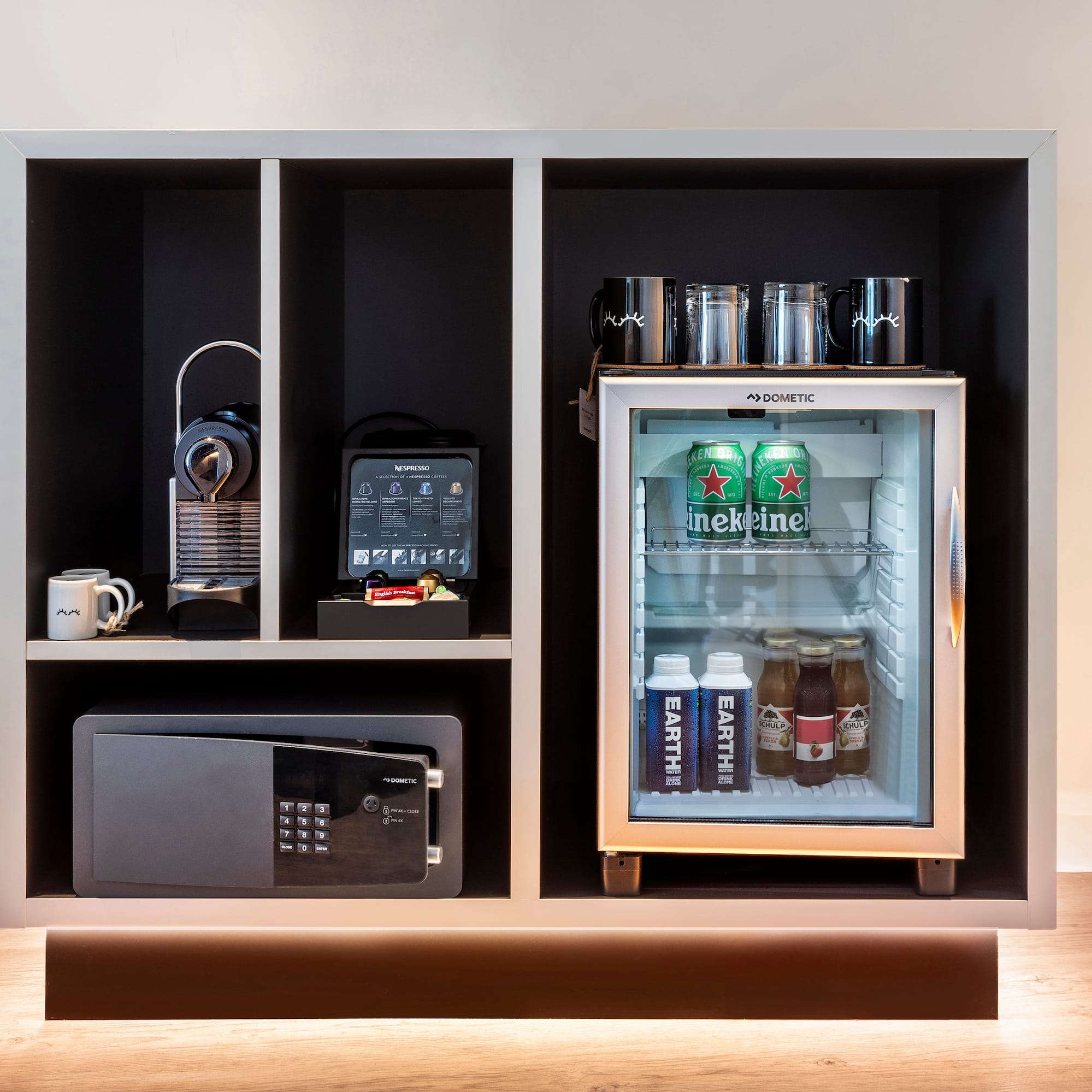 a refrigerator with drinks and a microwave