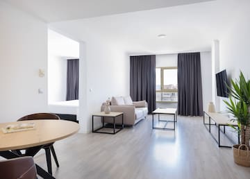 a living room with a couch and coffee table