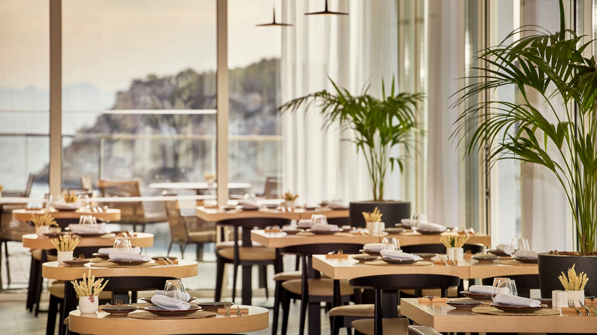 a restaurant with tables and chairs