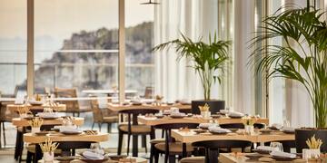 a restaurant with tables and chairs