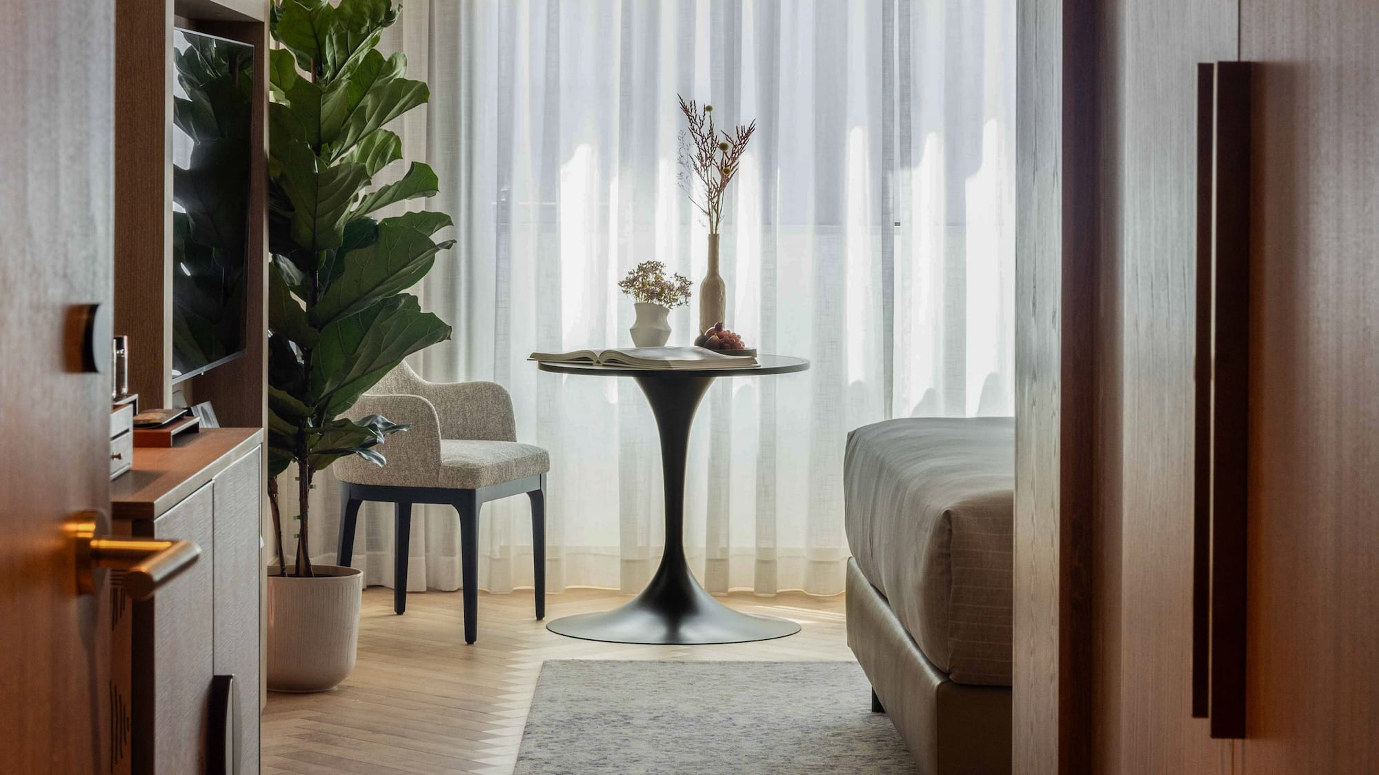 a room with a table and chairs