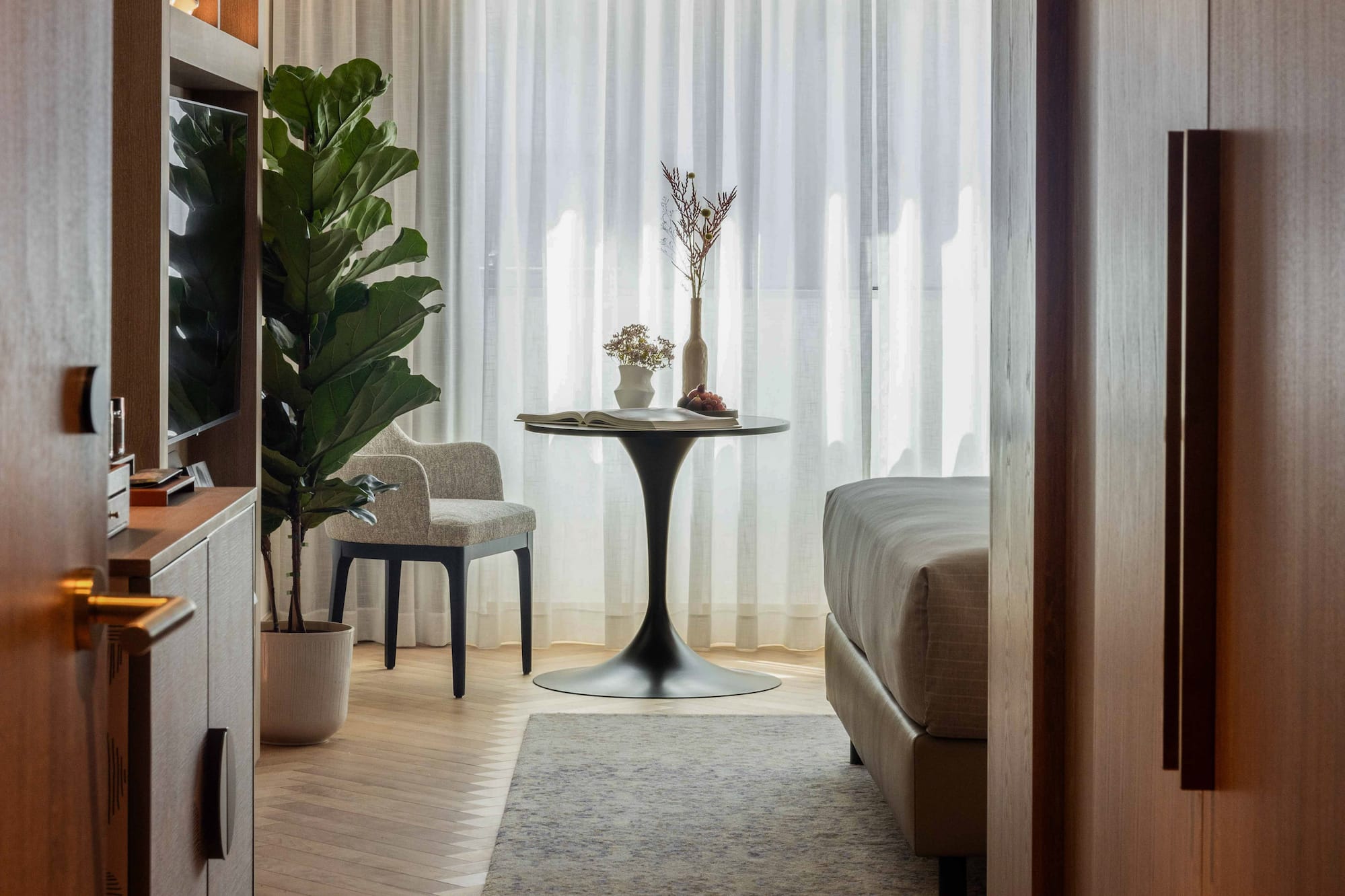 a room with a table and chairs