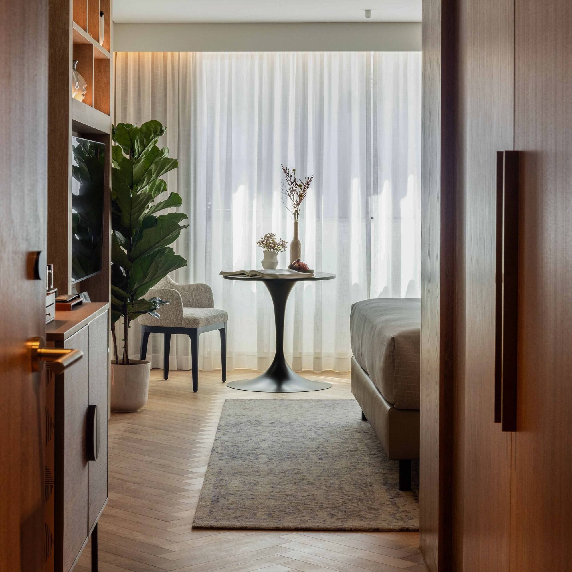 a room with a table and chairs