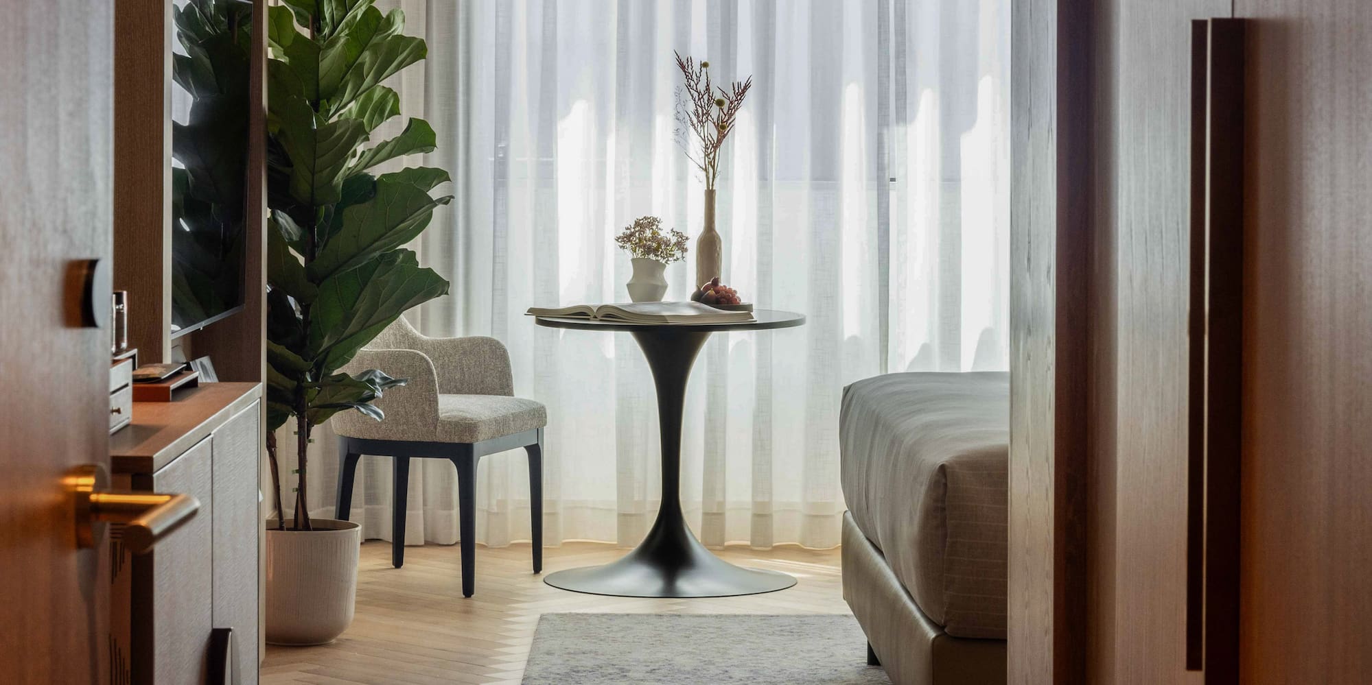 a room with a table and chairs