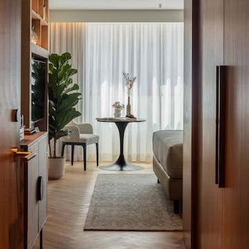 a room with a table and chairs