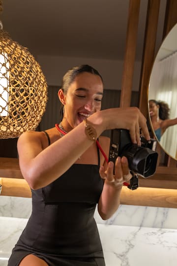 a woman taking a selfie