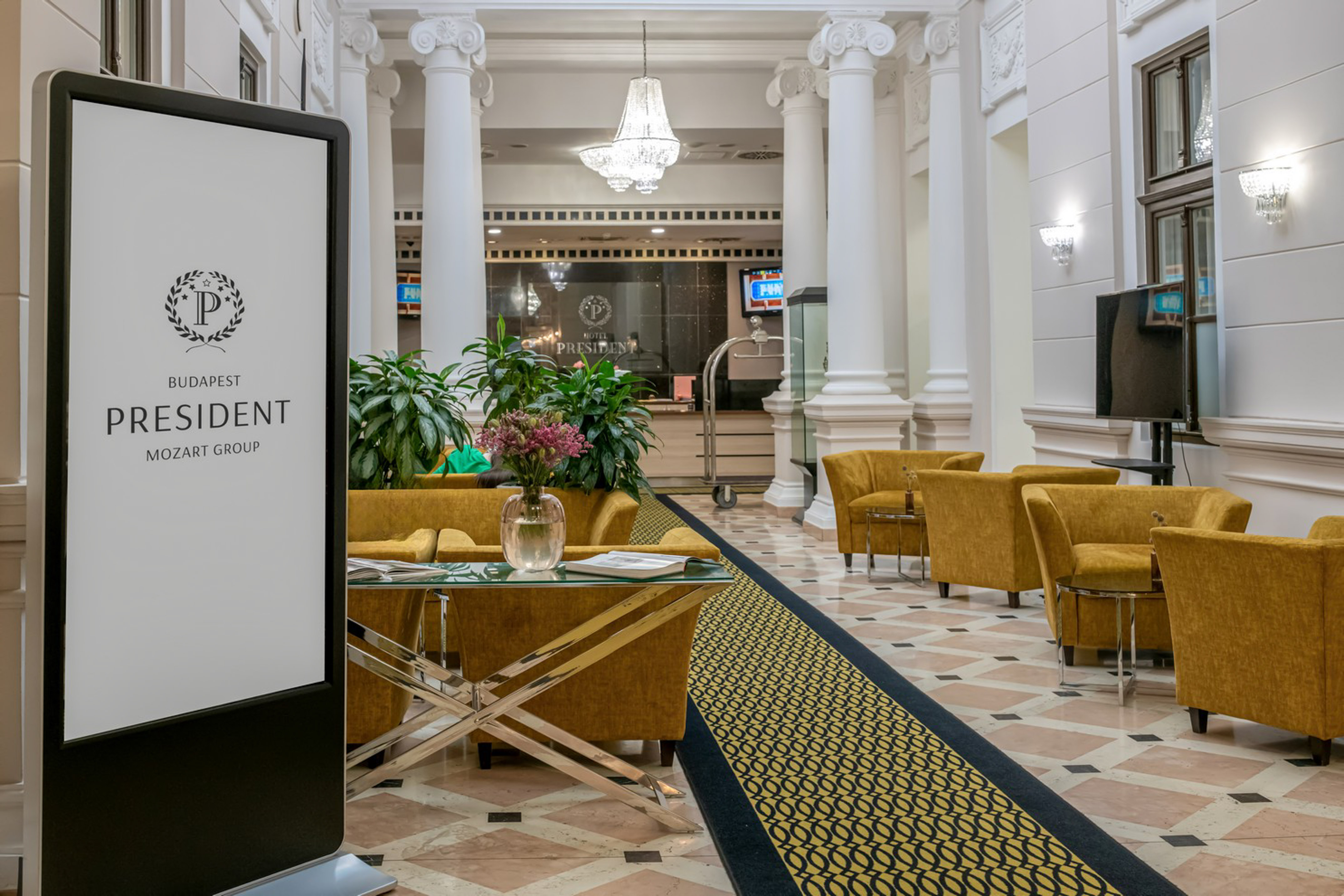 a large screen in a lobby