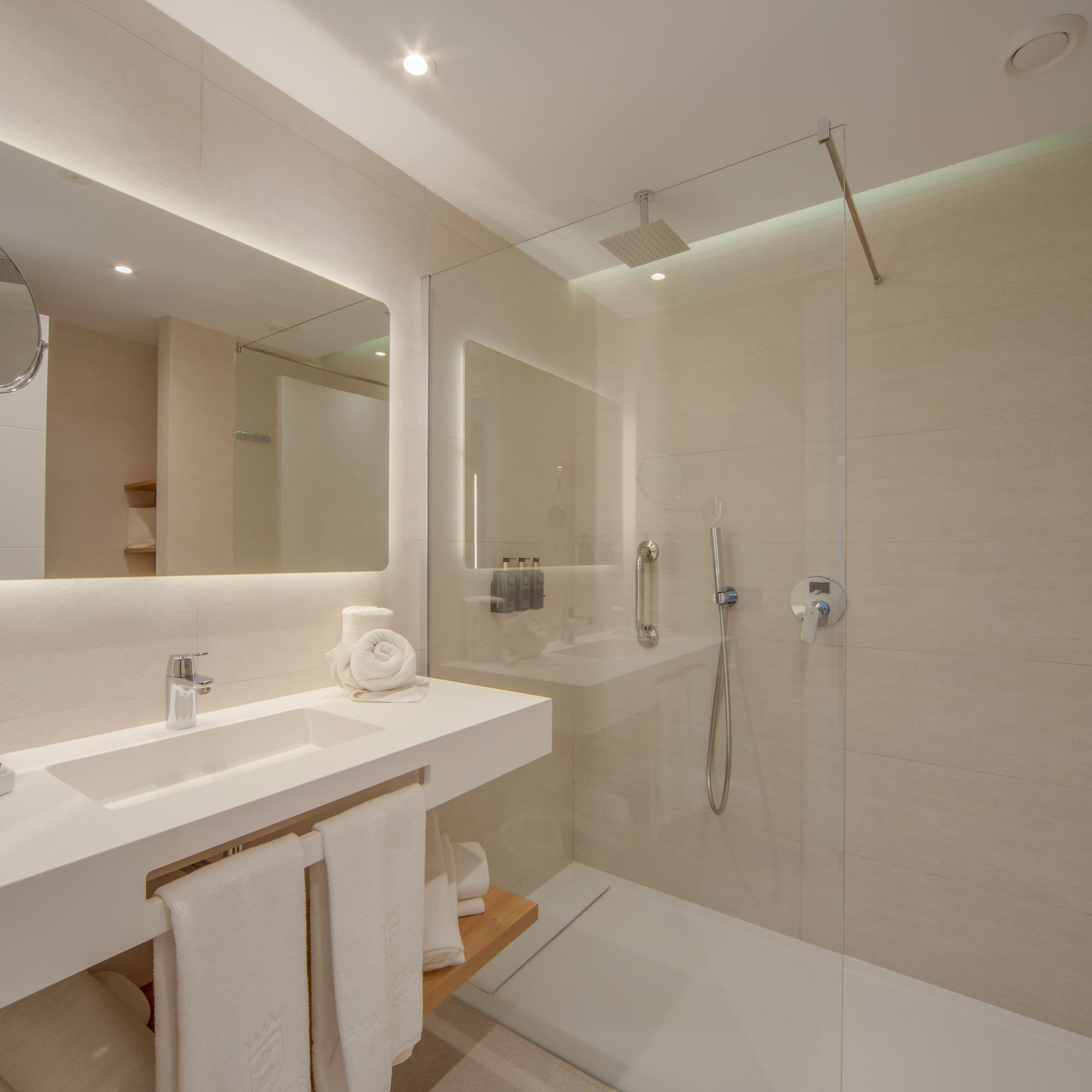 a bathroom with a shower and sink