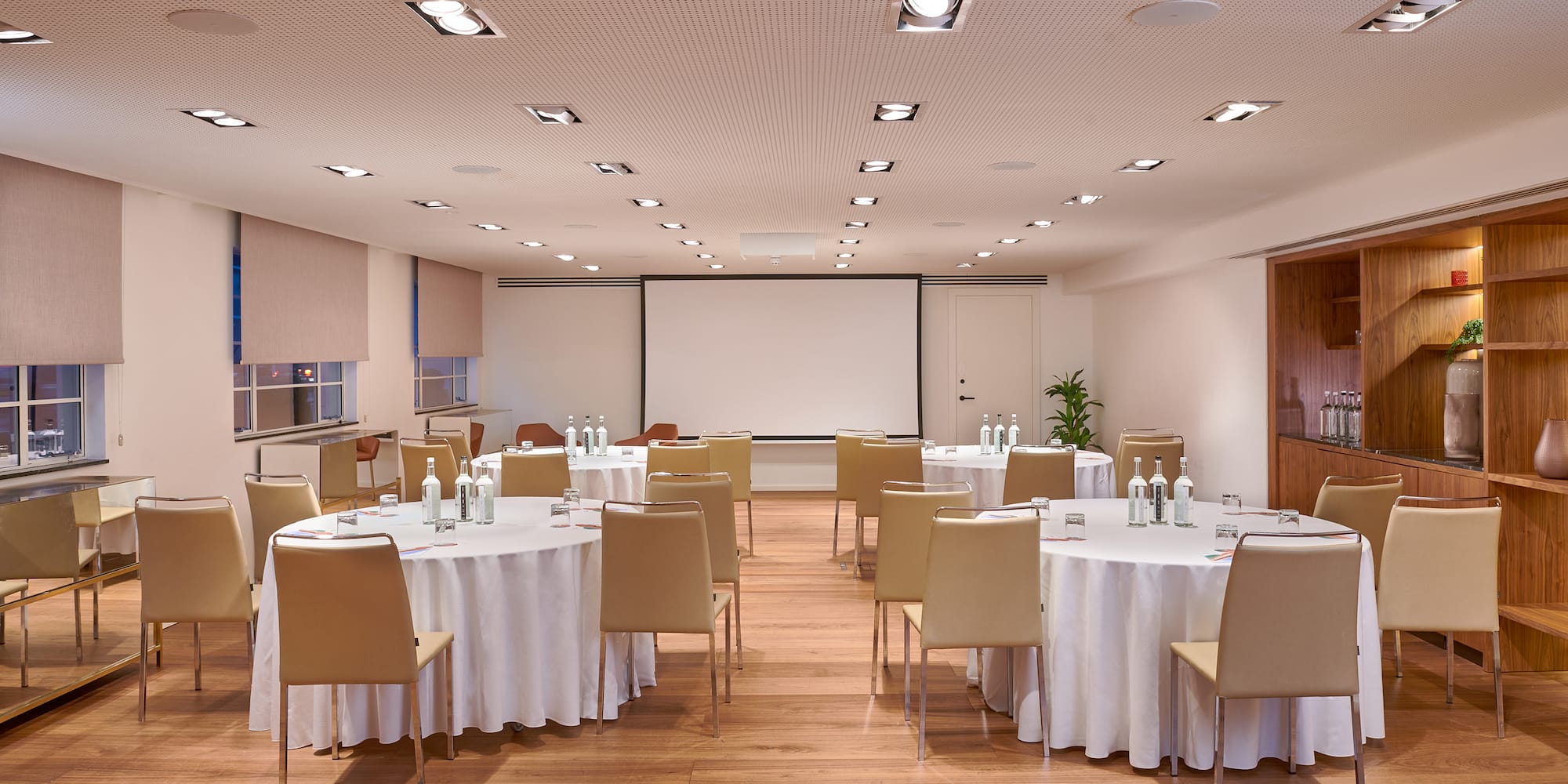 a room with tables and chairs