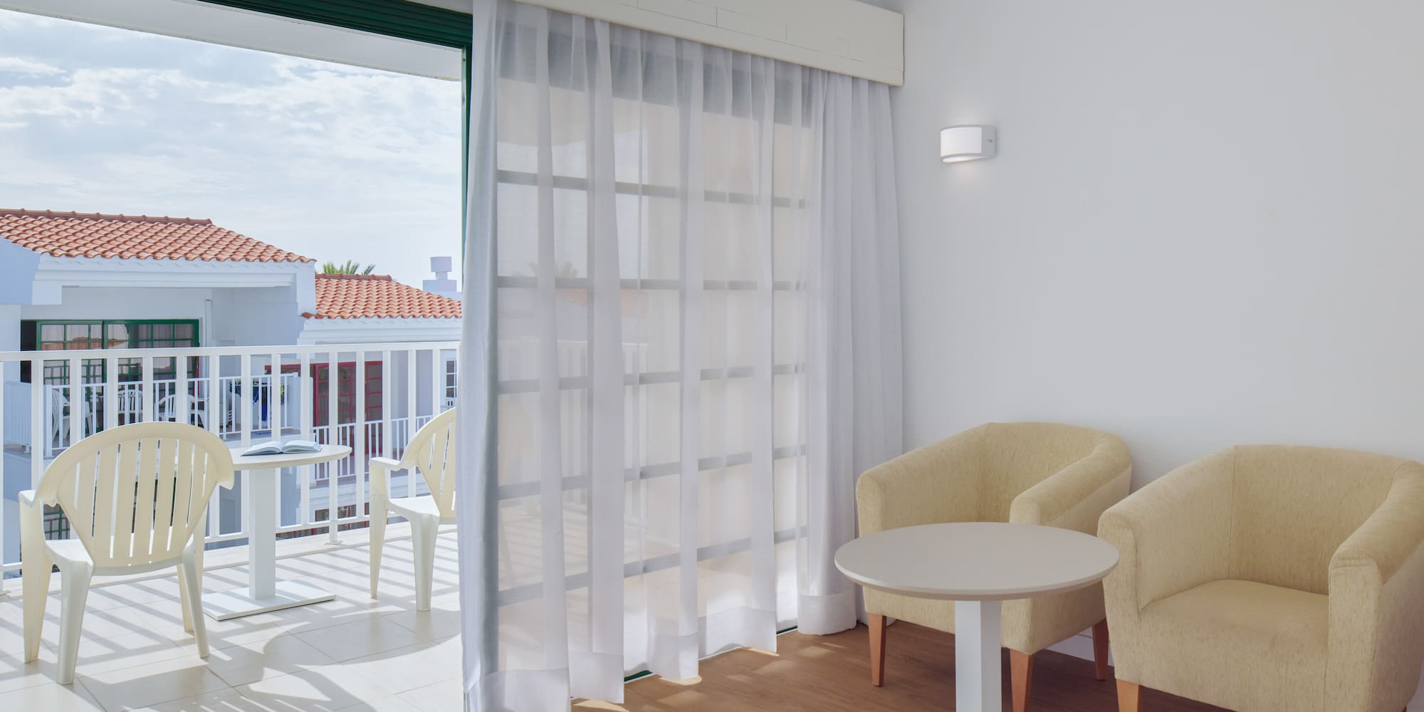 a room with a table and chairs