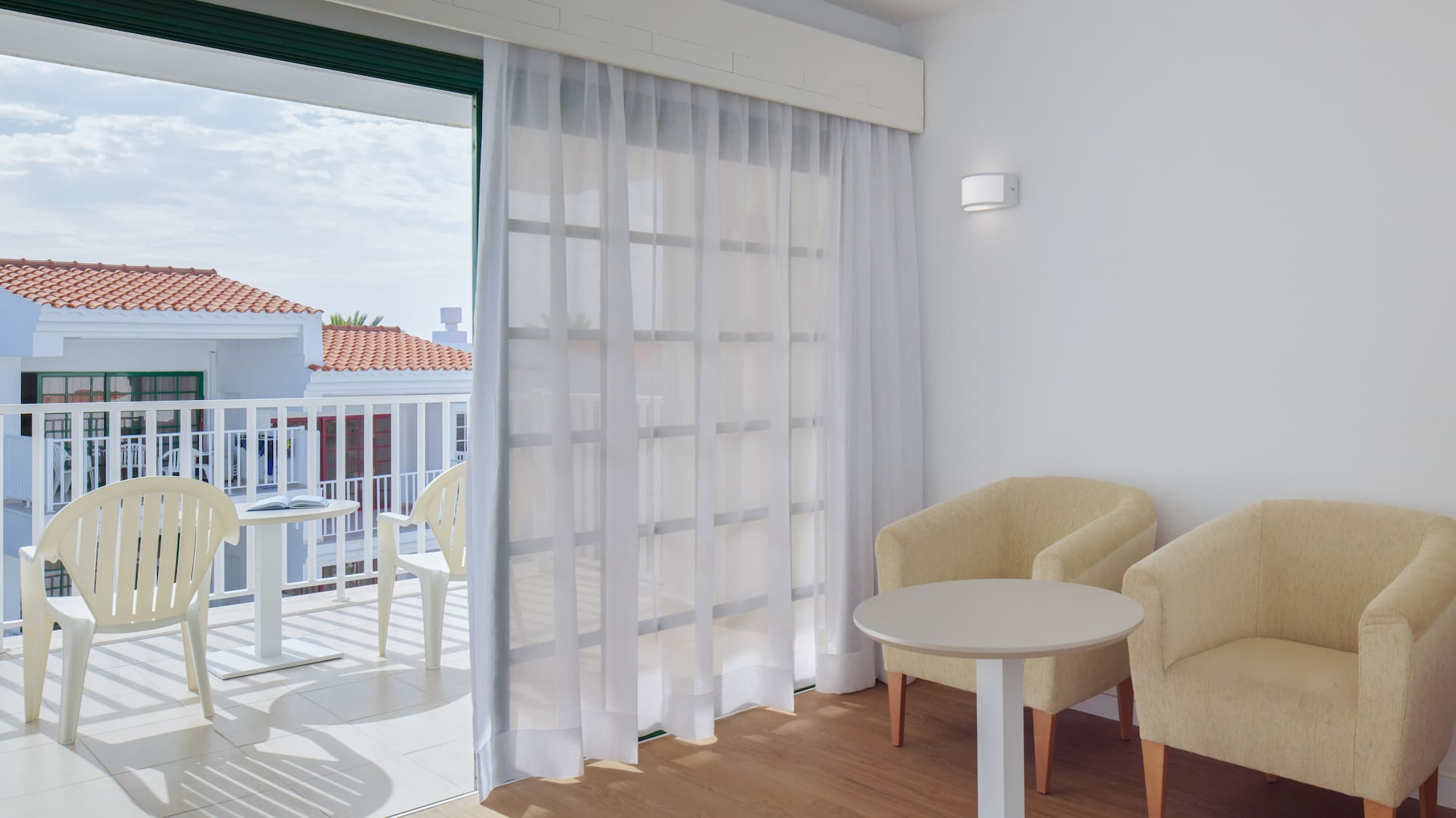 a room with a table and chairs