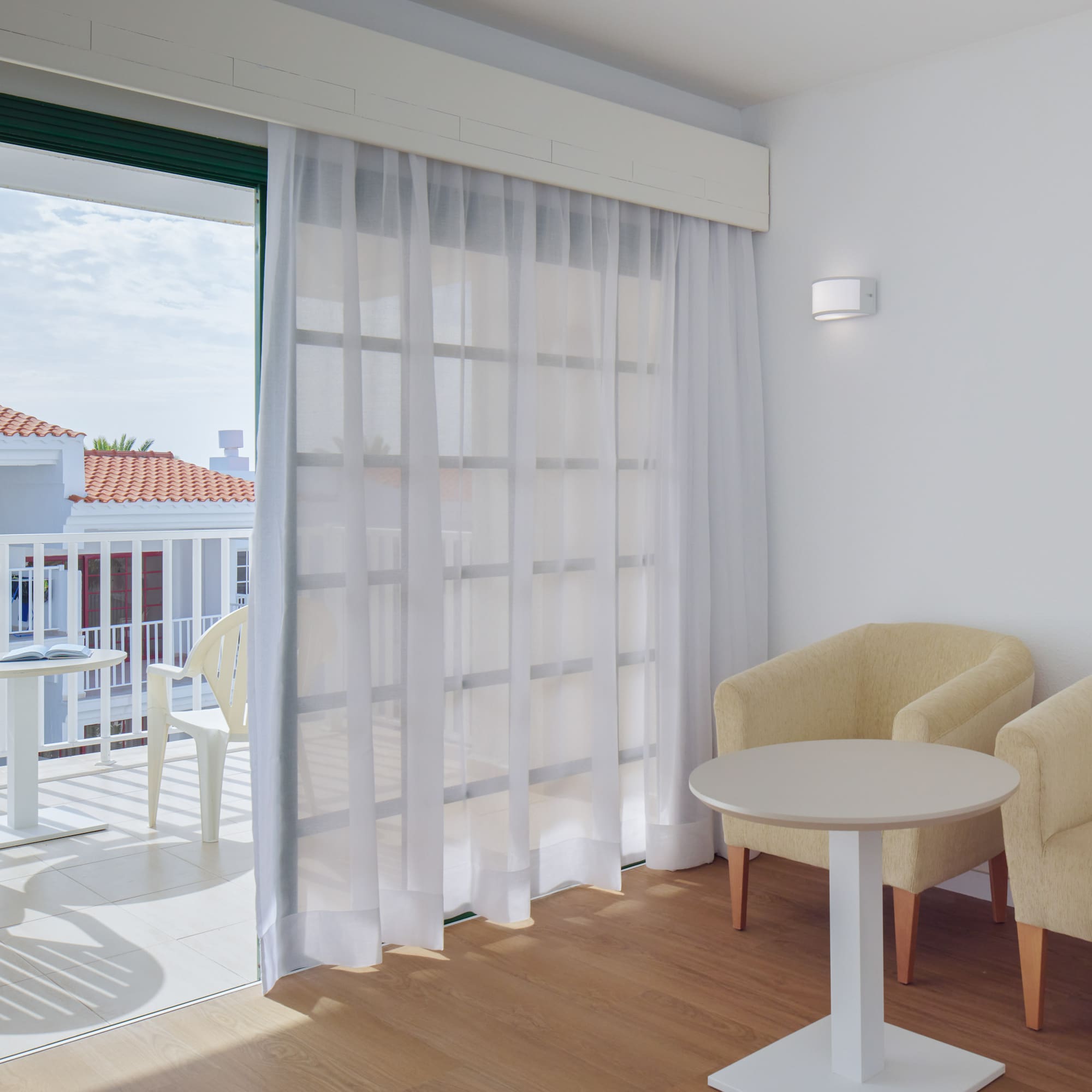 a room with a table and chairs